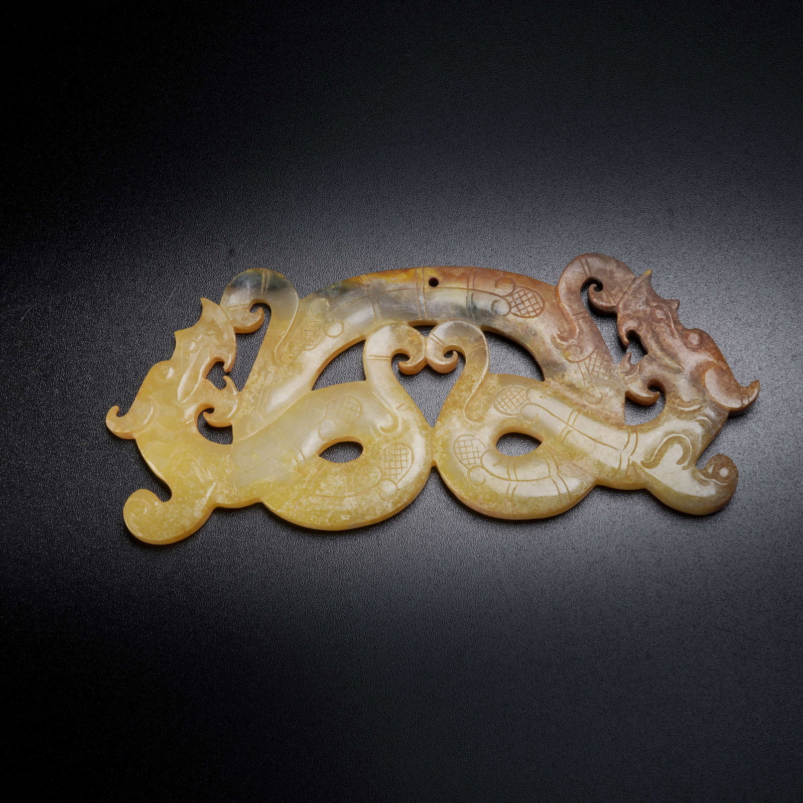 A ARCHAIC JADE DOUBLE-DRAGON HUANG (1 of 9)