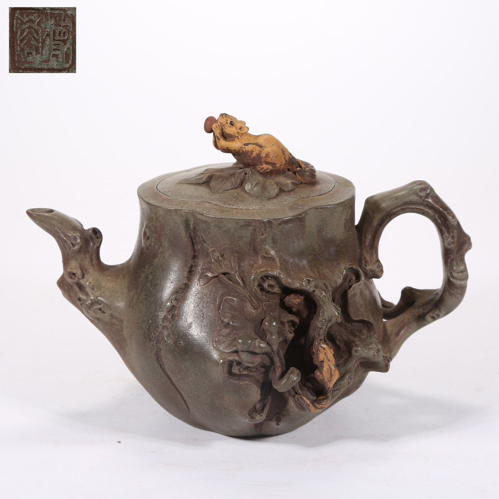 A YIXING (ZISHA) TEAPOT WITH RAT FINIAL: Yixing (zisha) teapot with rat finial