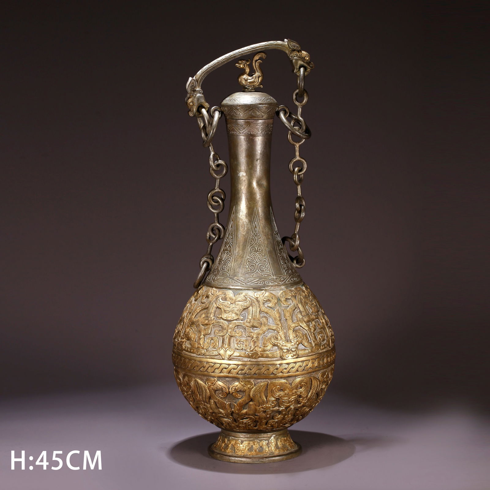 A GILT BRONZE COVERED VASE WITH BEAST FACE PATTERN: Gilt Bronze Covered Vase with Beast Face Pattern