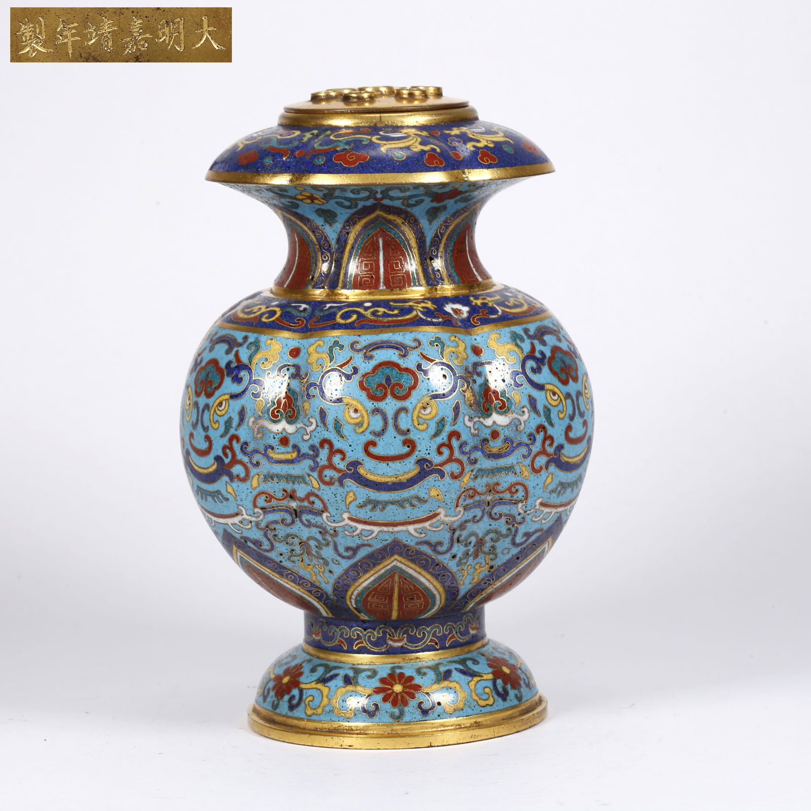 A BRONZE CLOISONNÉ FLOWER HOLDER: Bronze Cloisonné Flower Holder