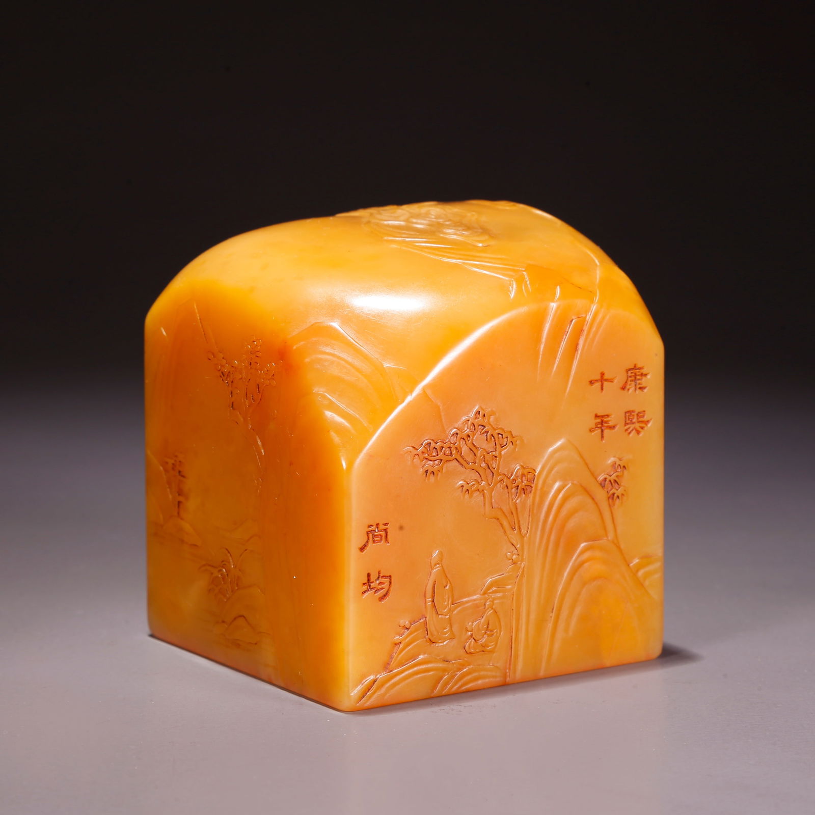 A SHOUSHAN TIANHUANG STONE SEAL WITH LANDSCAPE AND FIGURE MOTIF: Shoushan Tianhuang Stone Seal with Landscape and Figure Motif