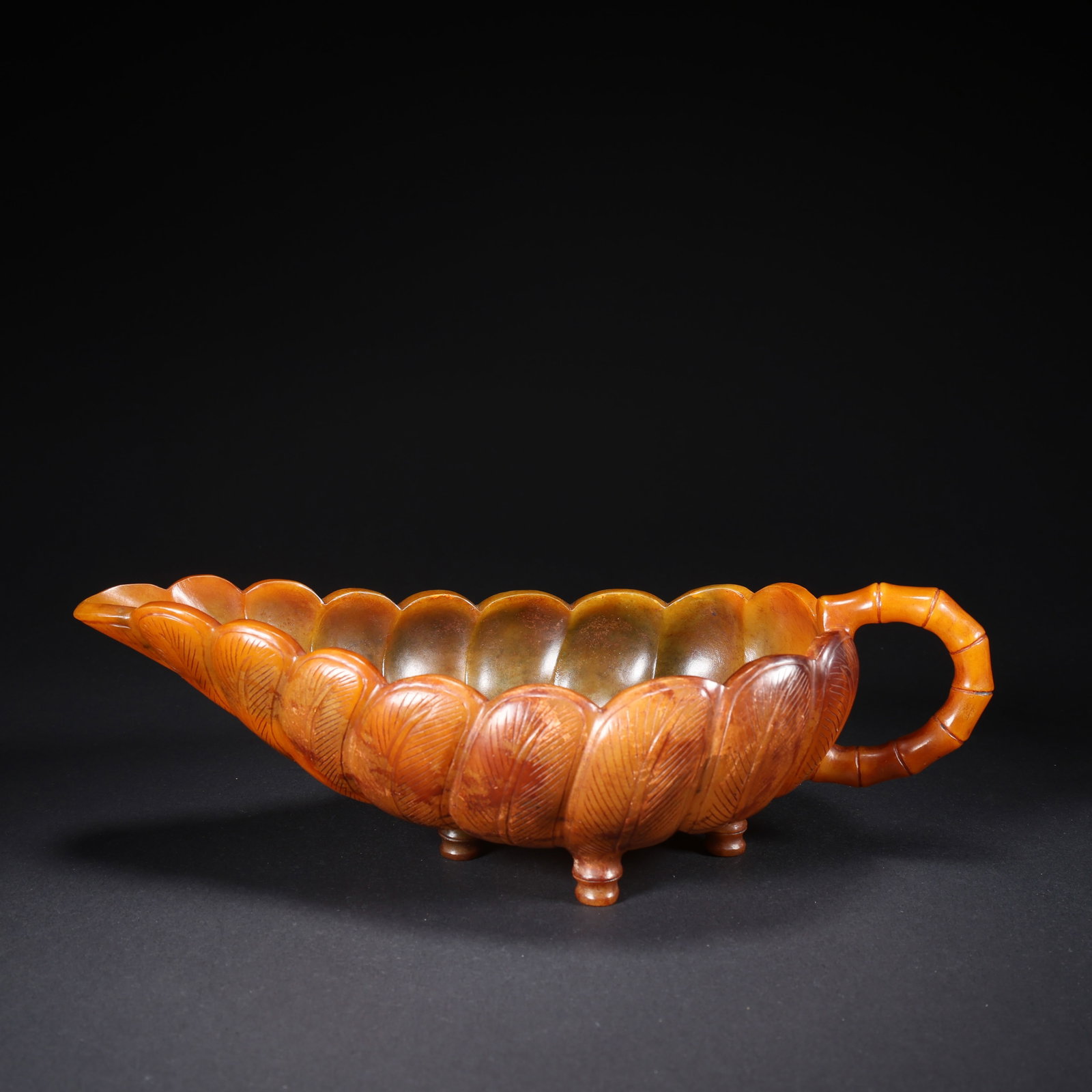 A HETIAN JADE LOTUS-LEAF FLOWER WASH BASIN: Hetian Jade Lotus-Leaf Flower Wash Basin