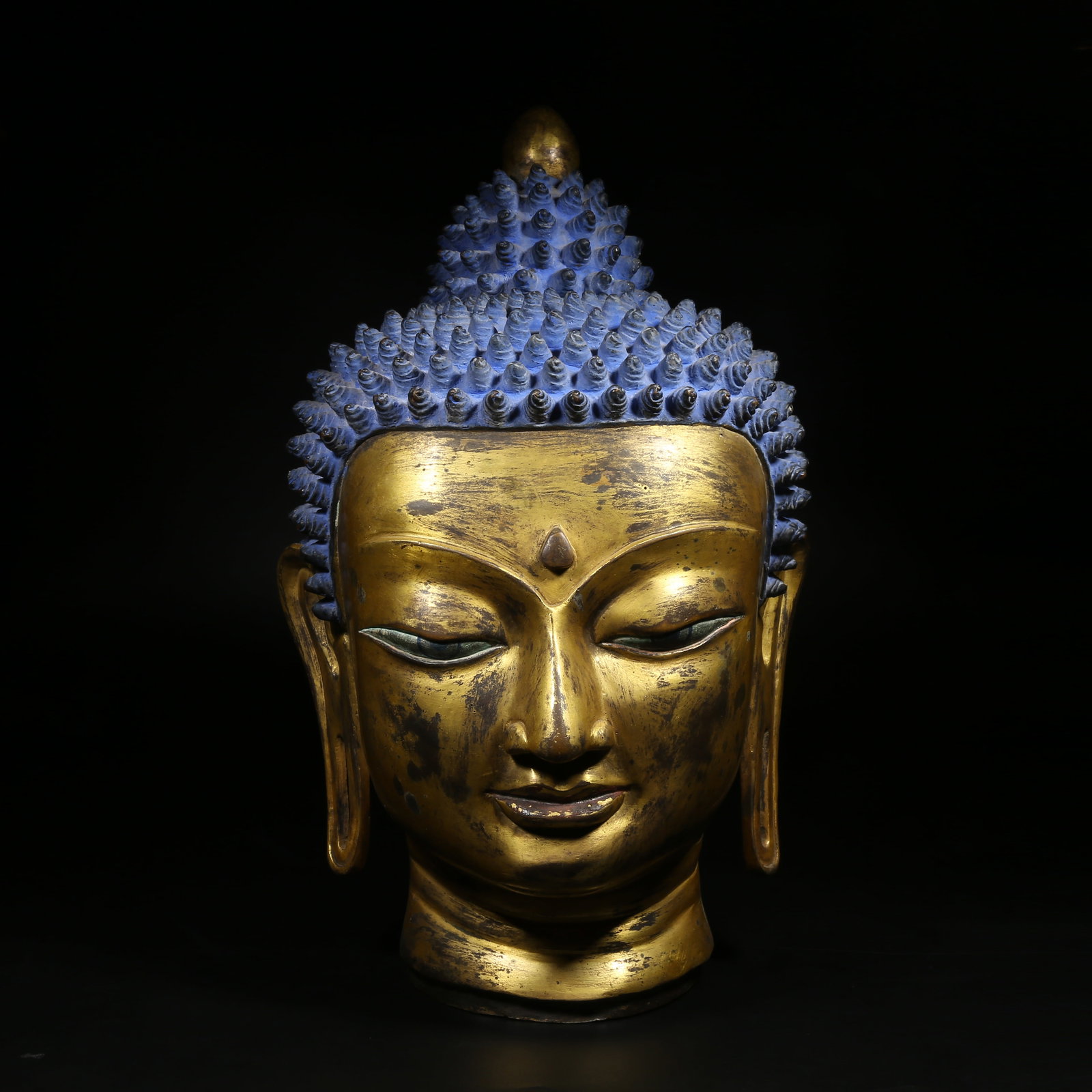 A GILT-BRONZE BUDDHA HEAD: Gilt-Bronze Buddha Head