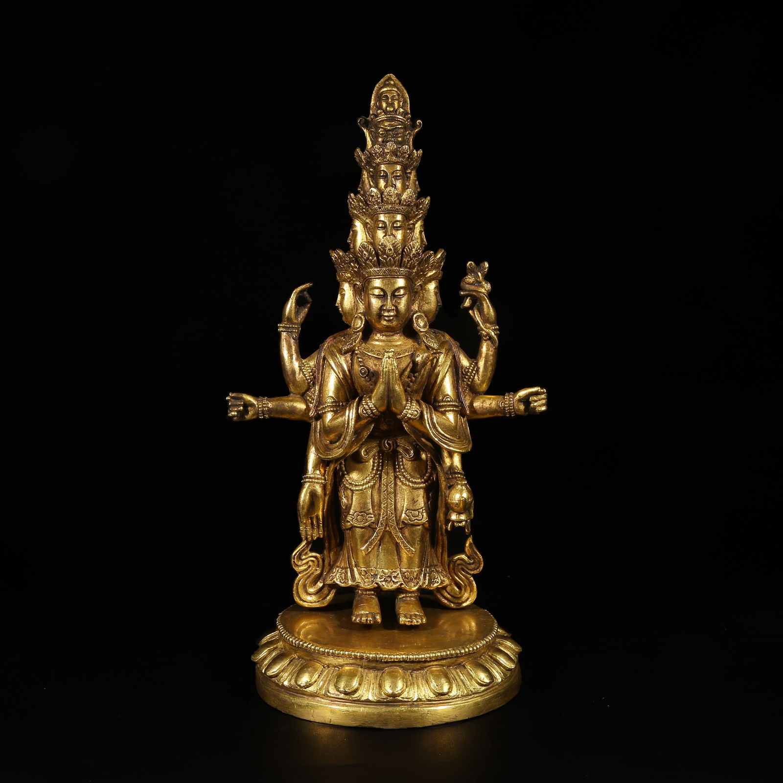A GILT-BRONZE STATUE OF ELEVEN-HEADED AVALOKITESHVARA: Gilt-Bronze Statue of Eleven-Headed Avalokiteshvara