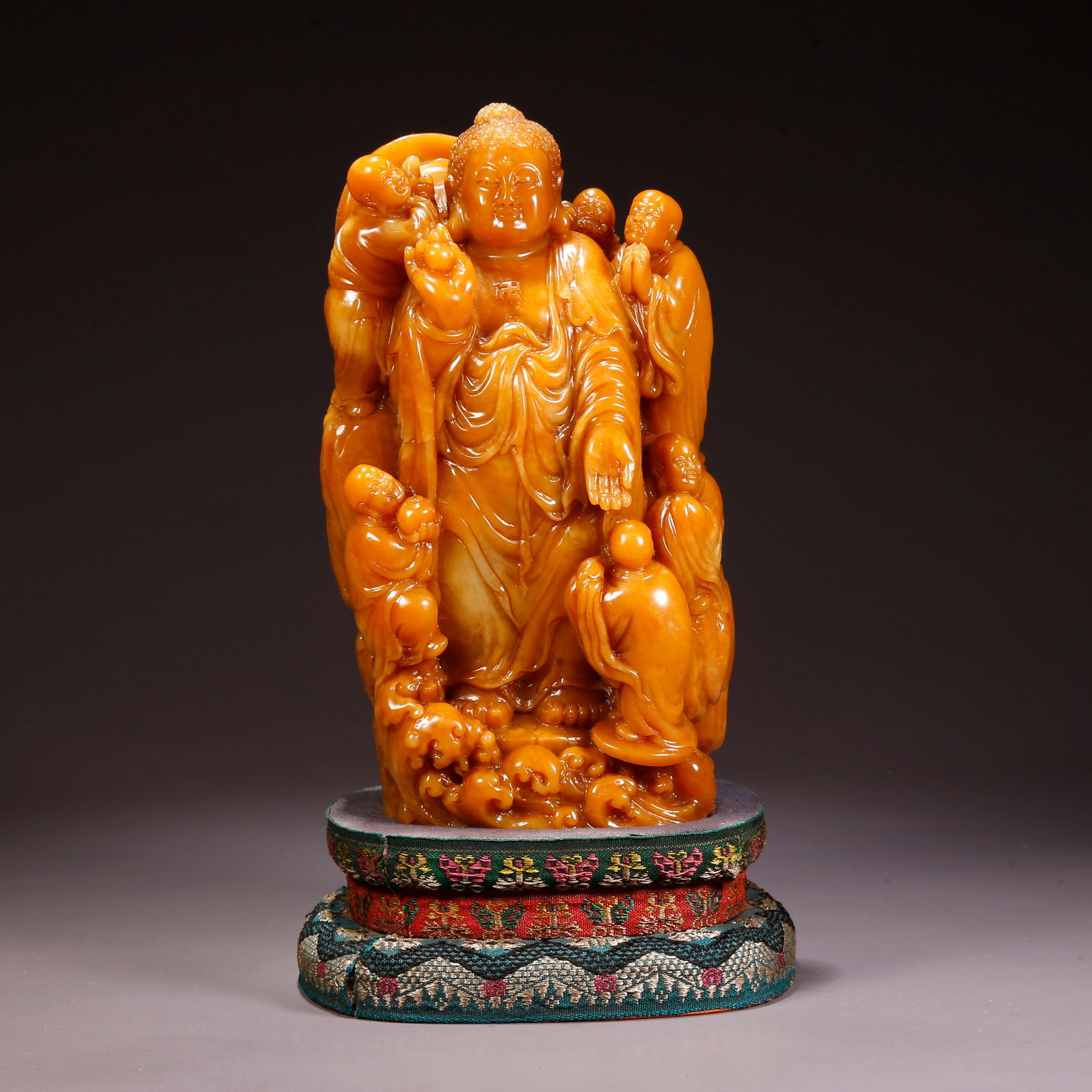 A SHOUSHAN TIANHUANG STONE CARVING IN BUDDHA FORM: Shoushan Tianhuang Stone Carving in Buddha Form
