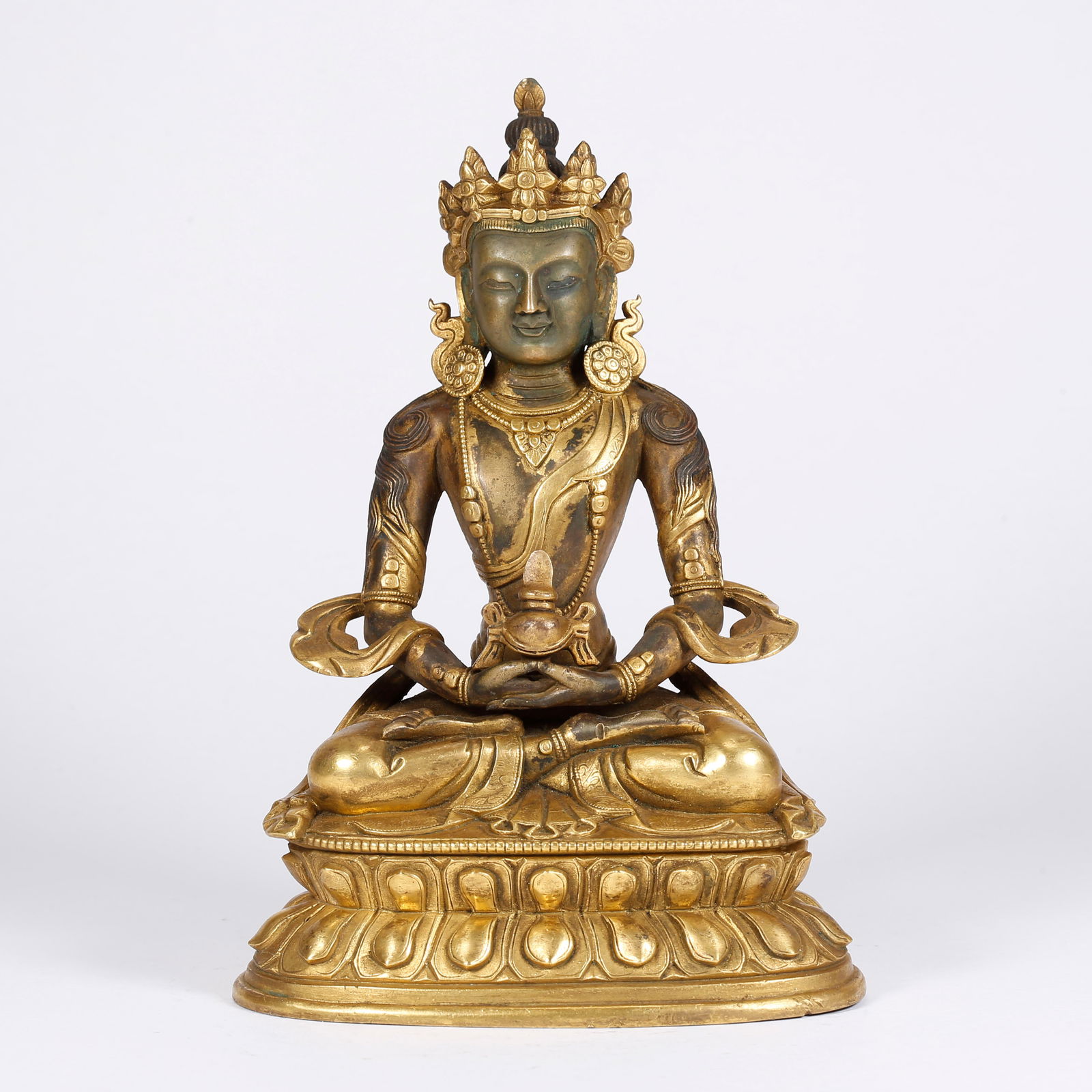 A GILT BRONZE MEDICINE BUDDHA STATUE: Gilt Bronze Medicine Buddha Statue