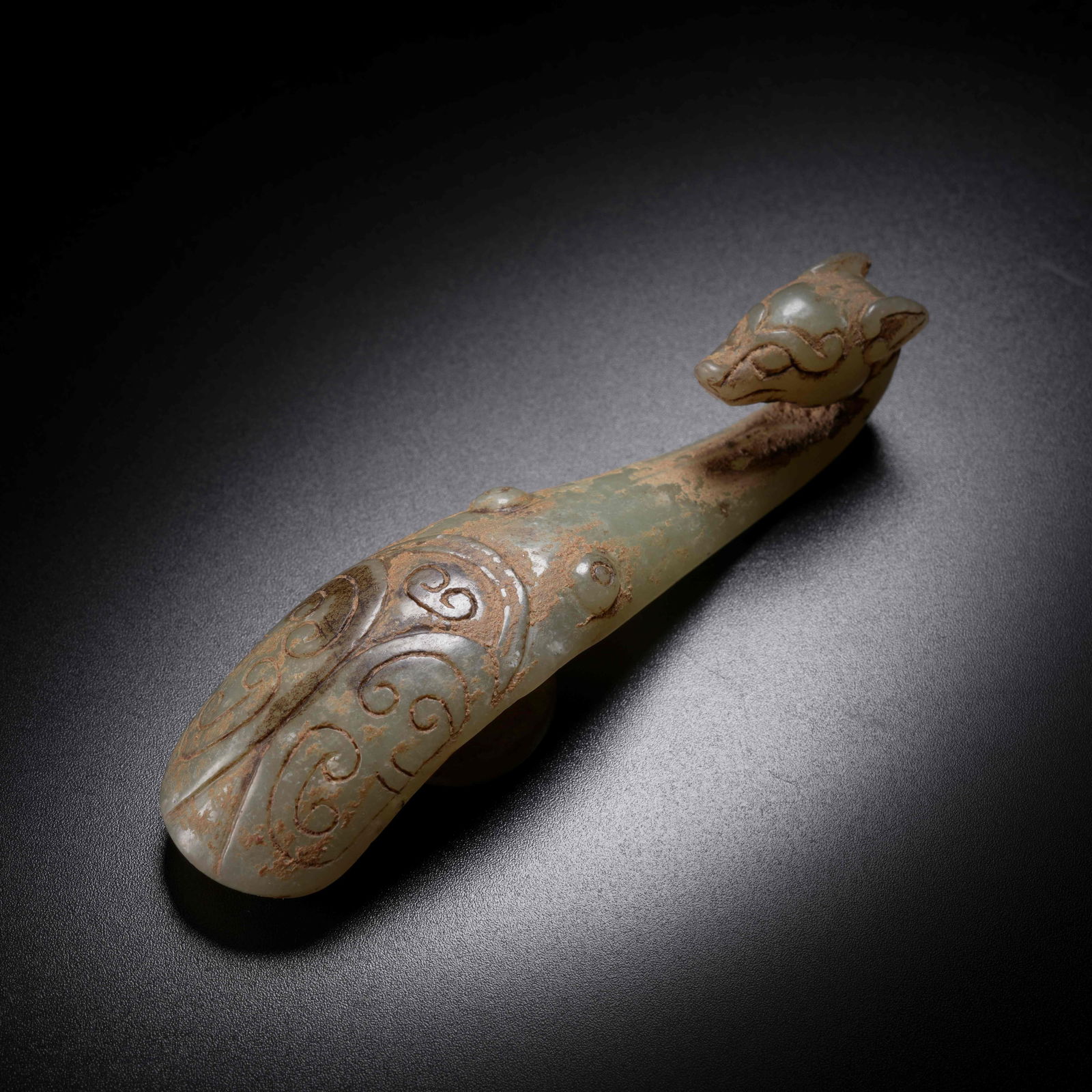 A ARCHAIC JADE DRAGON-HEAD BELT HOOK: Archaic Jade Dragon-Head Belt Hook