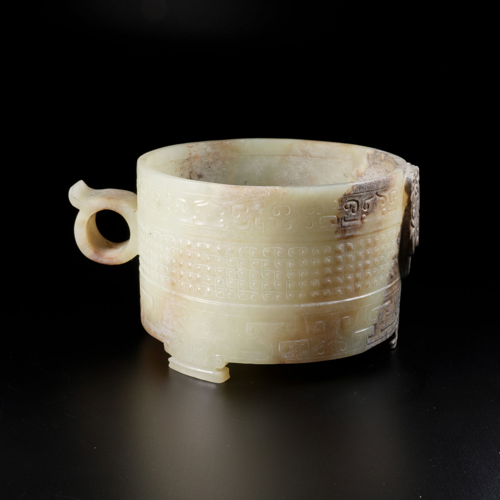 A ARCHAIC JADE ANIMAL MASK–PATTERN ZHI CUP: Archaic Jade Animal Mask–Pattern Zhi Cup