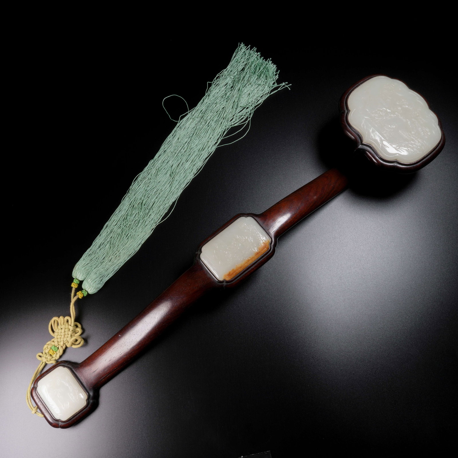 A HUANGHUALI WOOD RUYI INLAID WITH HETIAN WHITE JADE, SCHOLAR UNDER PINE SCENE: Huanghuali Wood Ruyi Inlaid with Hetian White Jade, Scholar under Pine Scene