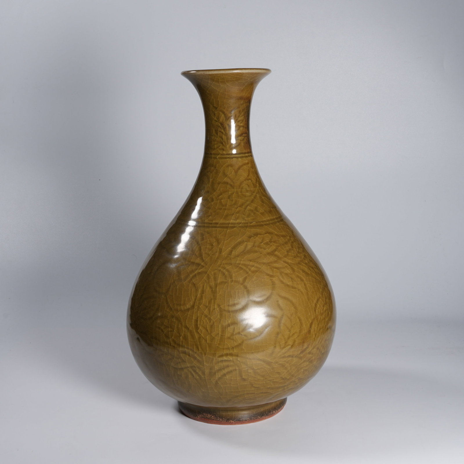 A LONGQUAN WARE YUHUCHUNPING VASE WITH SCROLLING FLOWER-AND-FRUIT MOTIFS: Longquan ware yuhuchunping vase with scrolling flower-and-fruit motifs