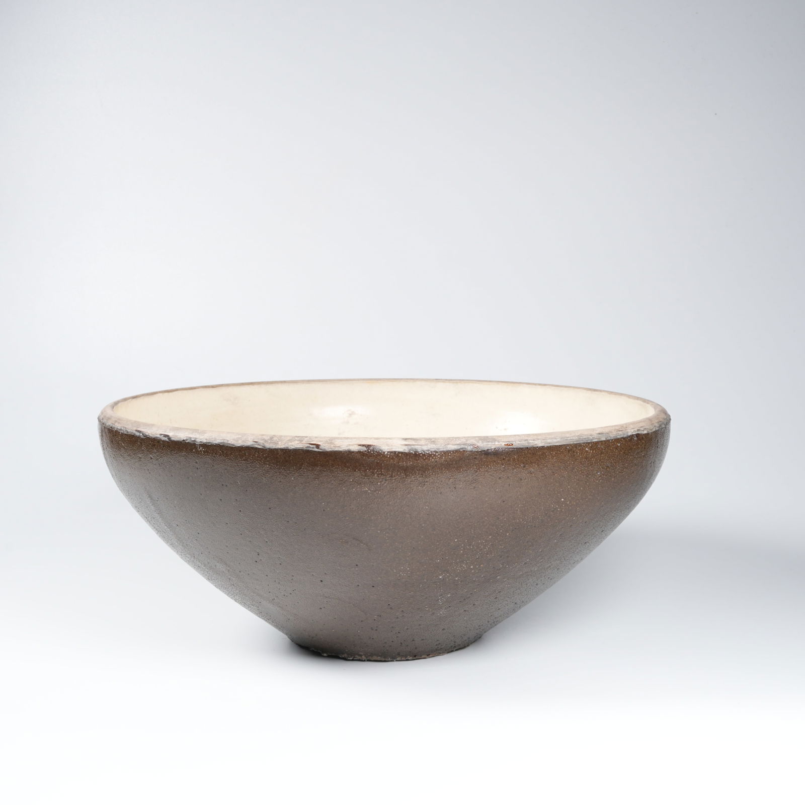 A OLD KILN BOWL: Old kiln bowl