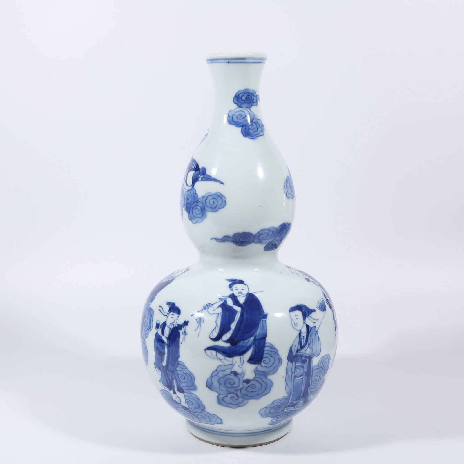A BLUE AND WHITE DOUBLE-GOURD VASE WITH EIGHT IMMORTALS DESIGN: Blue and White Double-gourd Vase with Eight Immortals Design