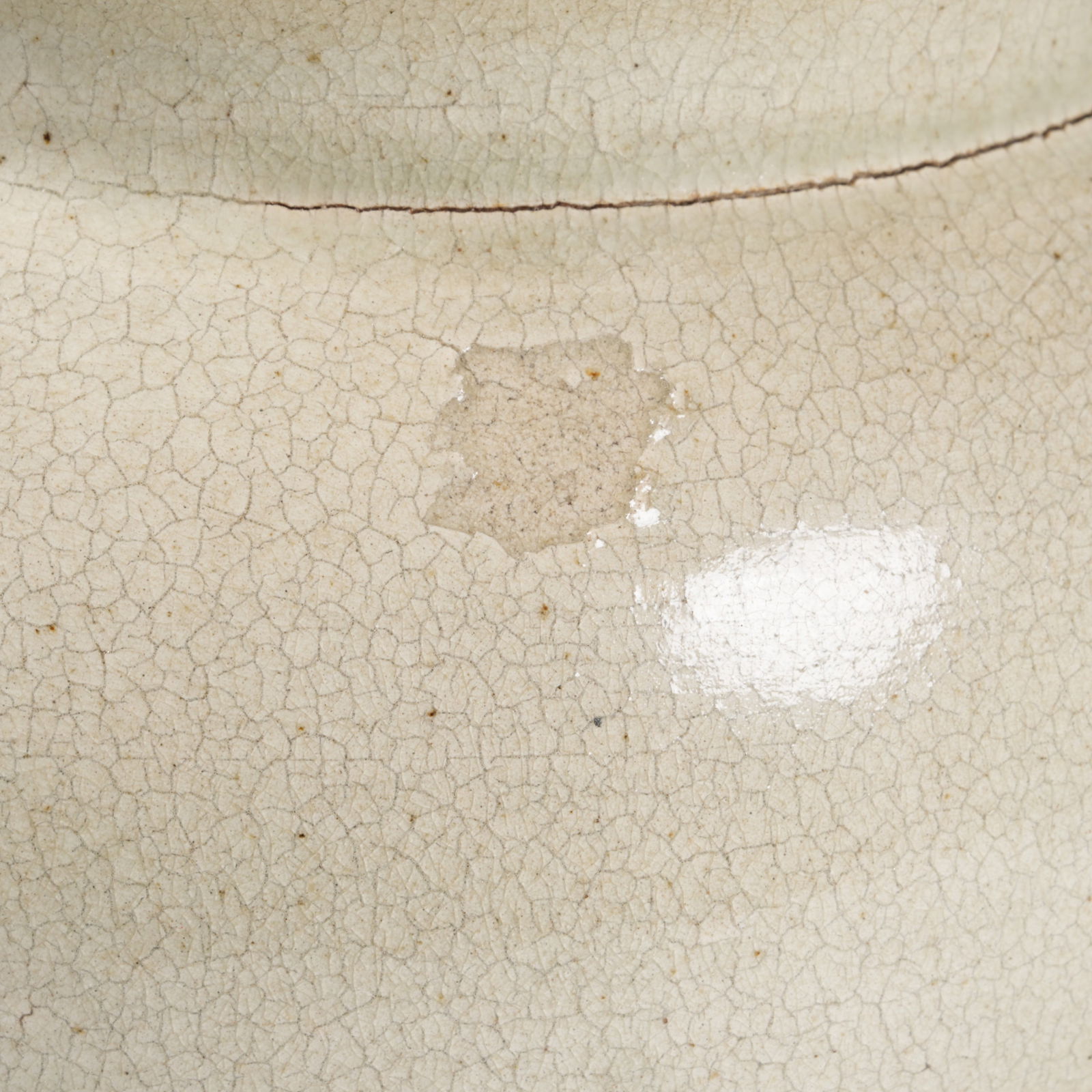 A WHITE-GLAZED JAR - 5