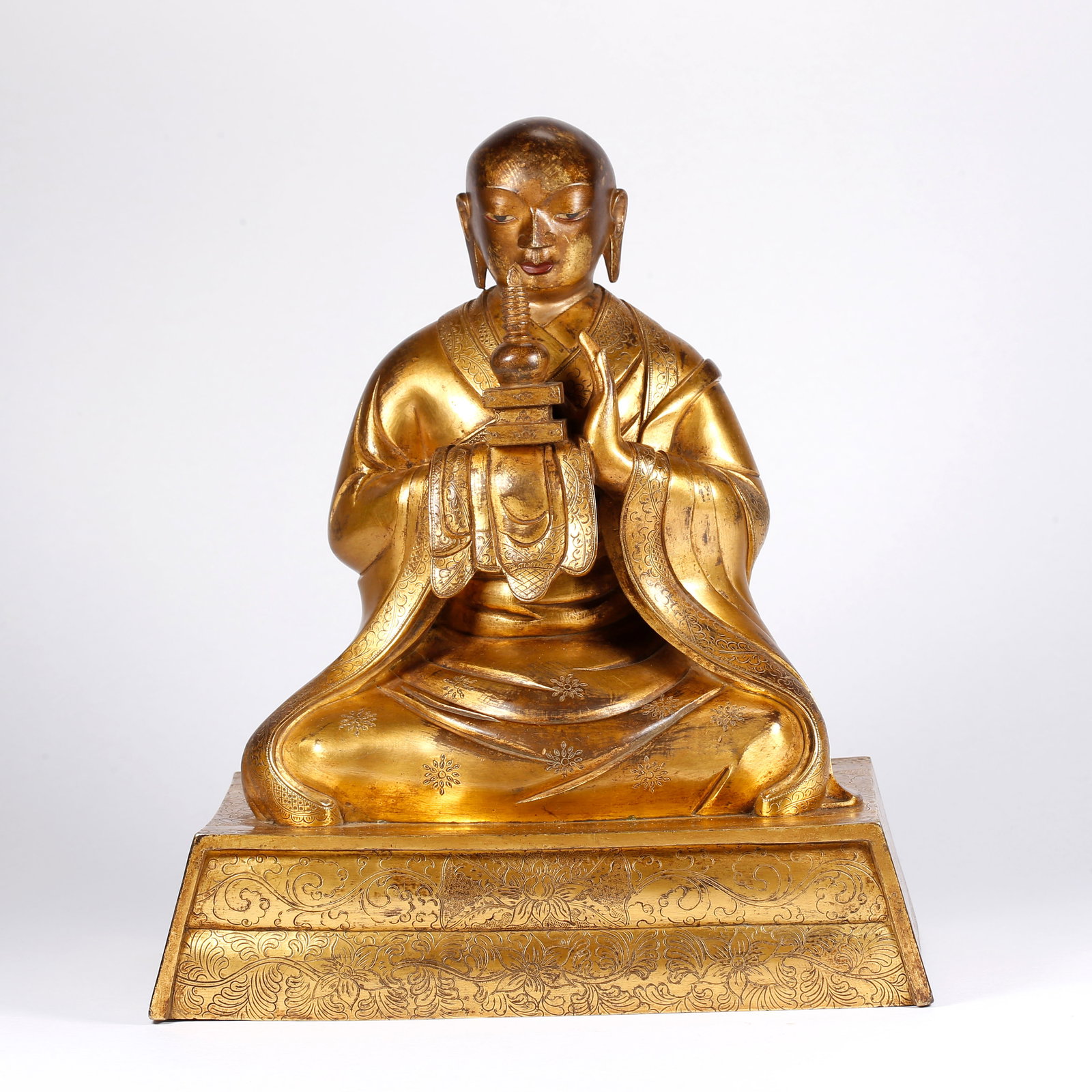A GILT BRONZE LAMA STATUE: Gilt Bronze Lama Statue