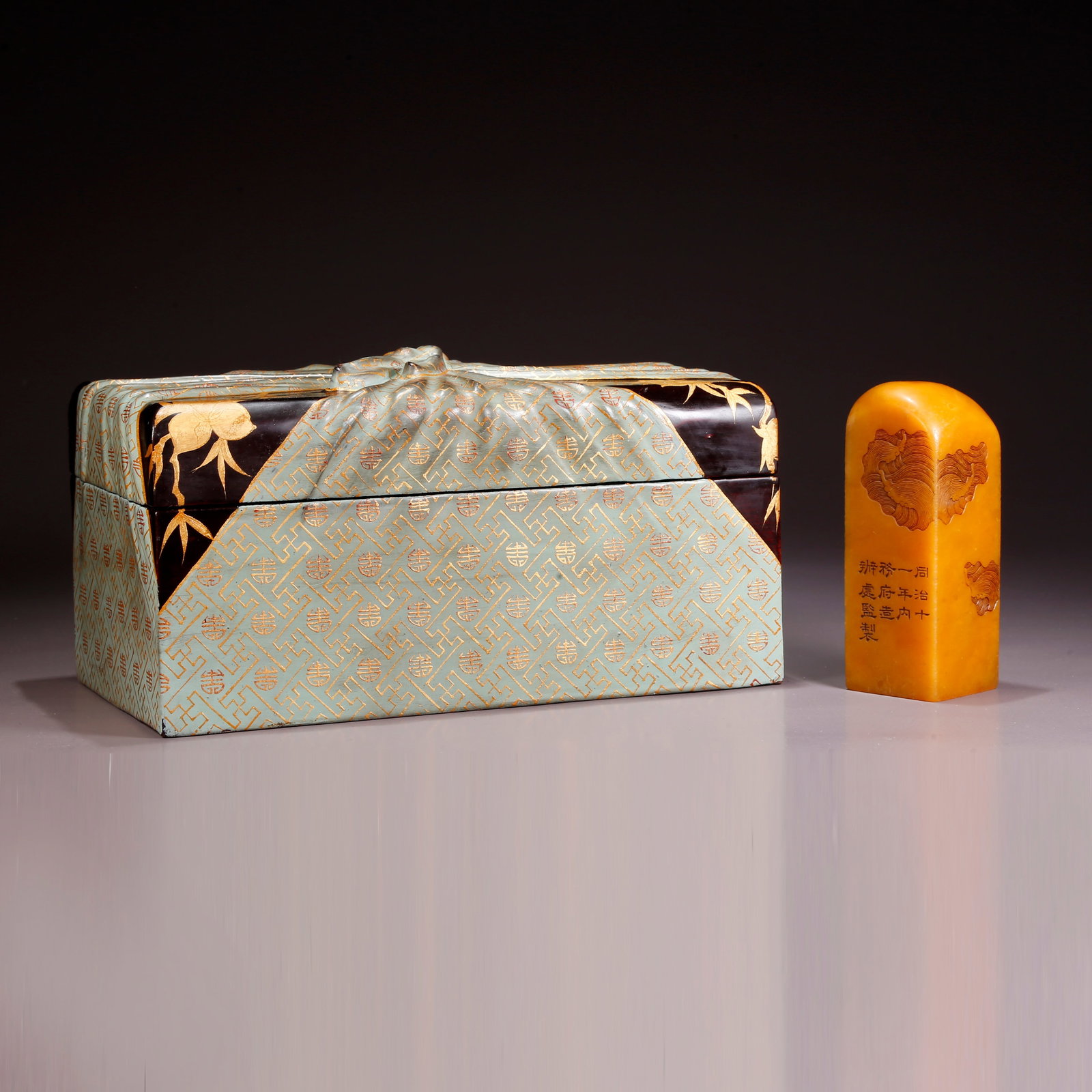 A SHOUSHAN TIANHUANG STONE SEAL WITH SEA DRAGON MOTIF: Shoushan Tianhuang Stone Seal with Sea Dragon Motif