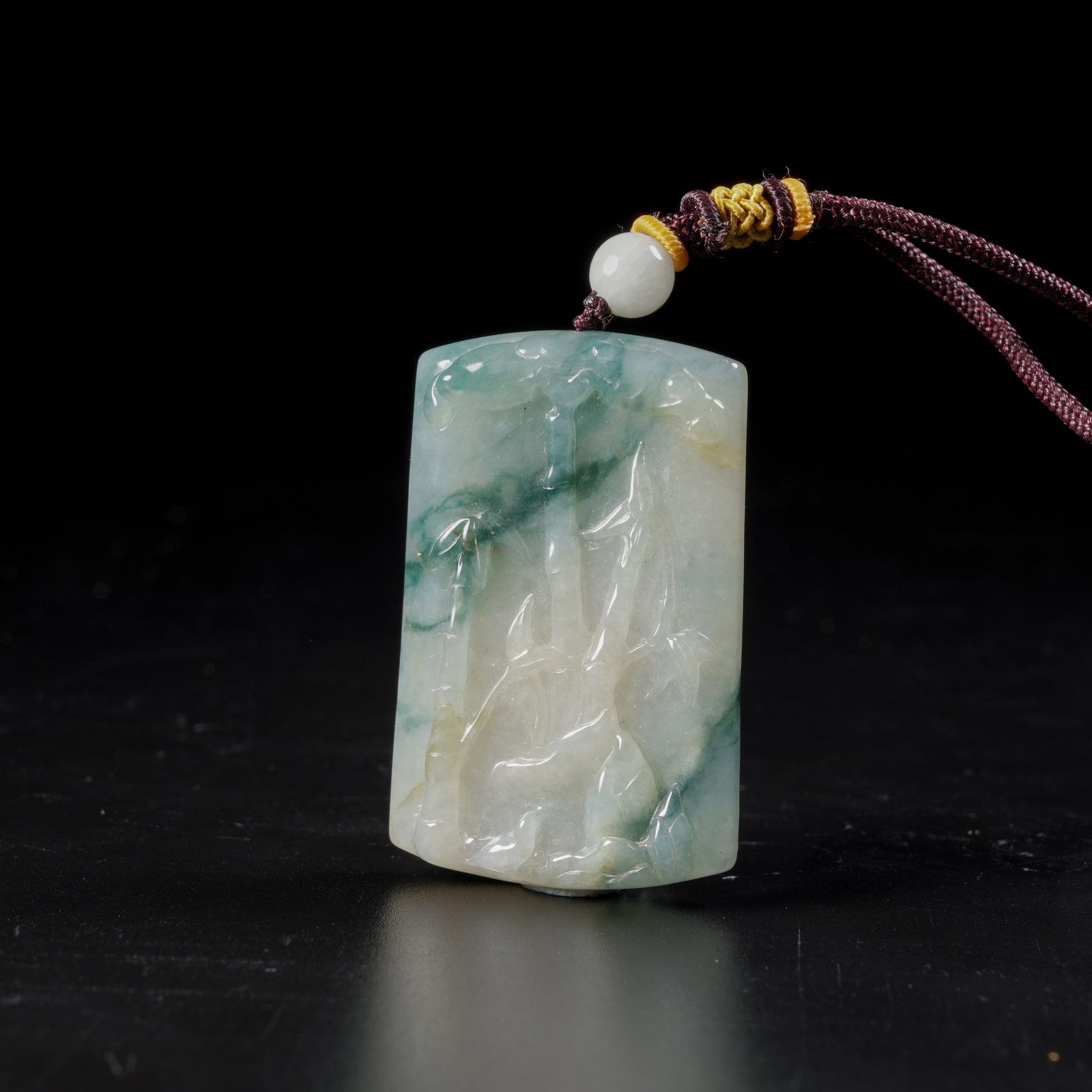 A JADEITE BAMBOO-PATTERN PLAQUE: Jadeite Bamboo-Pattern Plaque