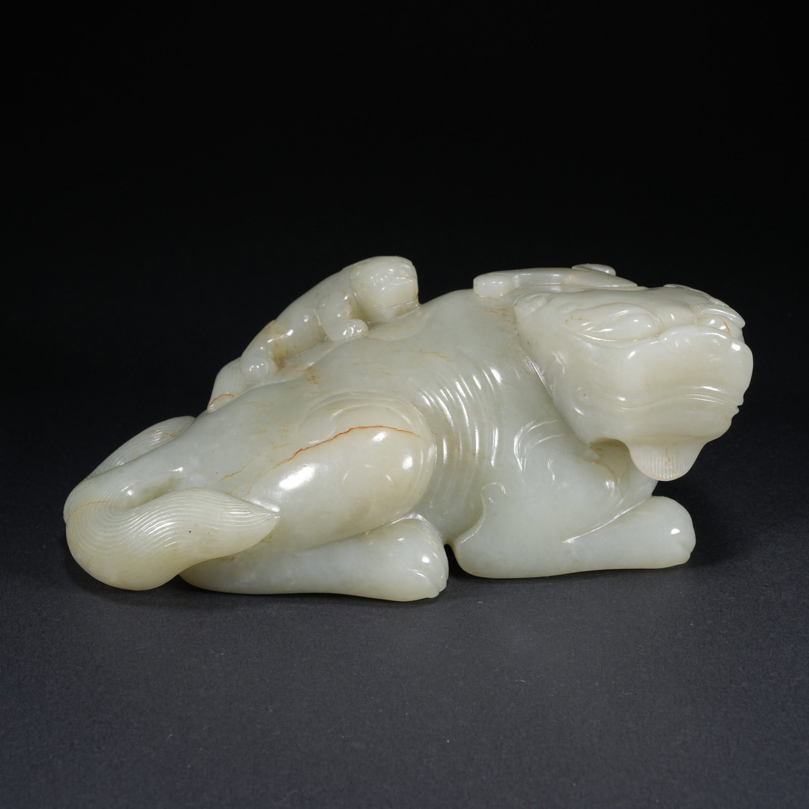 A HETIAN JADE CARVED LARGE AND SMALL LION FIGURES: Hetian Jade Carved Large and Small Lion Figures