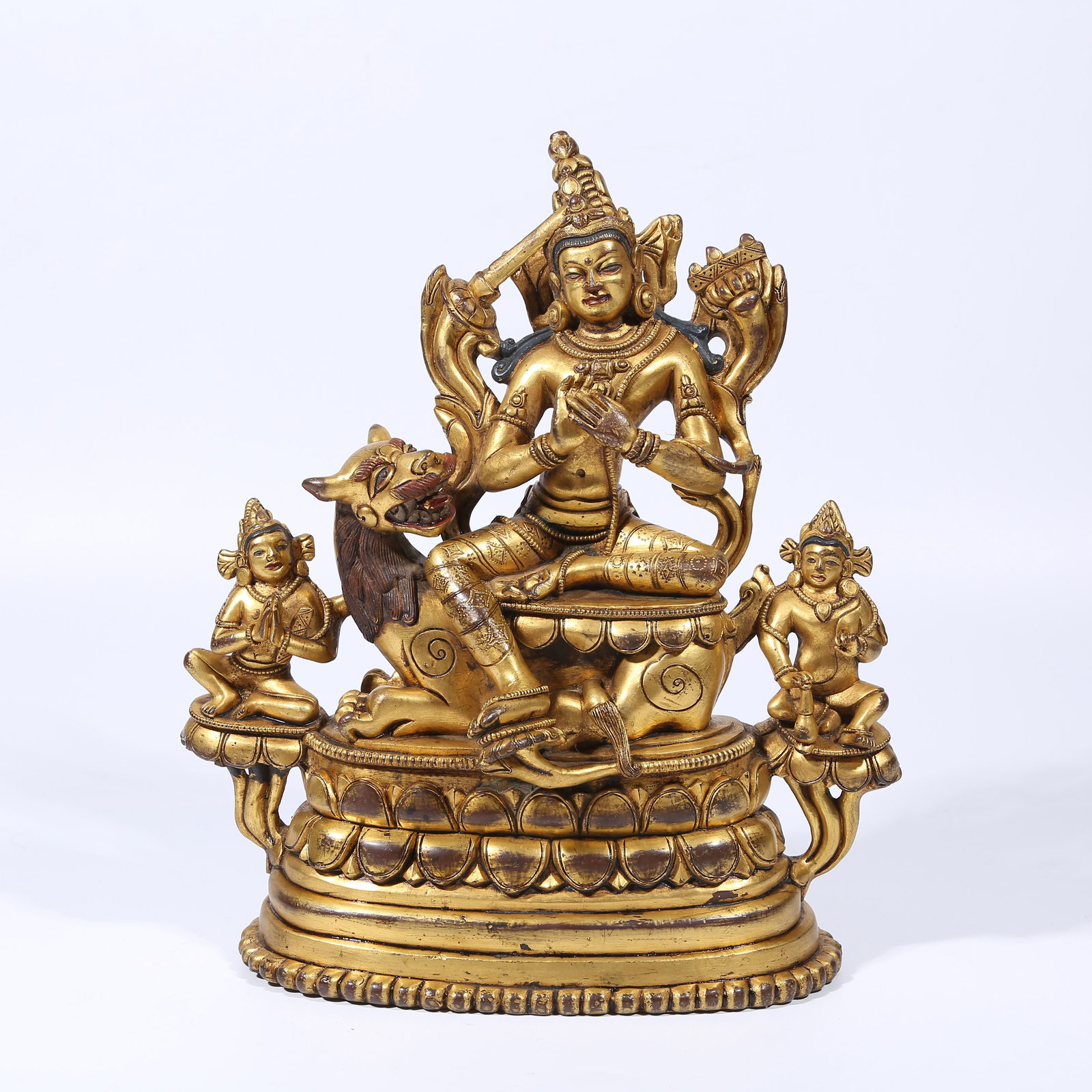 A GILT BRONZE MANJUSHRI BODHISATTVA STATUE: Gilt Bronze Manjushri Bodhisattva Statue