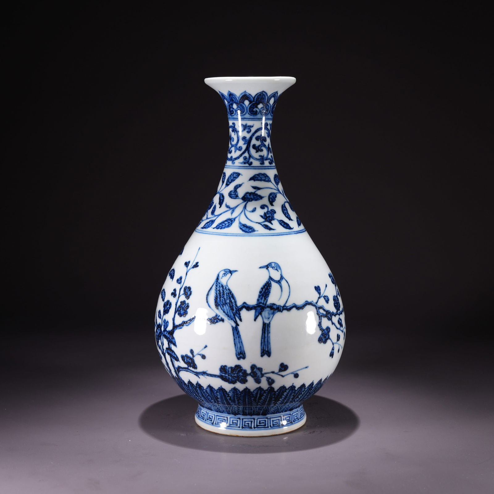 A BLUE-AND-WHITE YUHUCHUN VASE WITH FLOWER-AND-BIRD MOTIF: Blue-and-White Yuhuchun Vase with Flower-and-Bird Motif