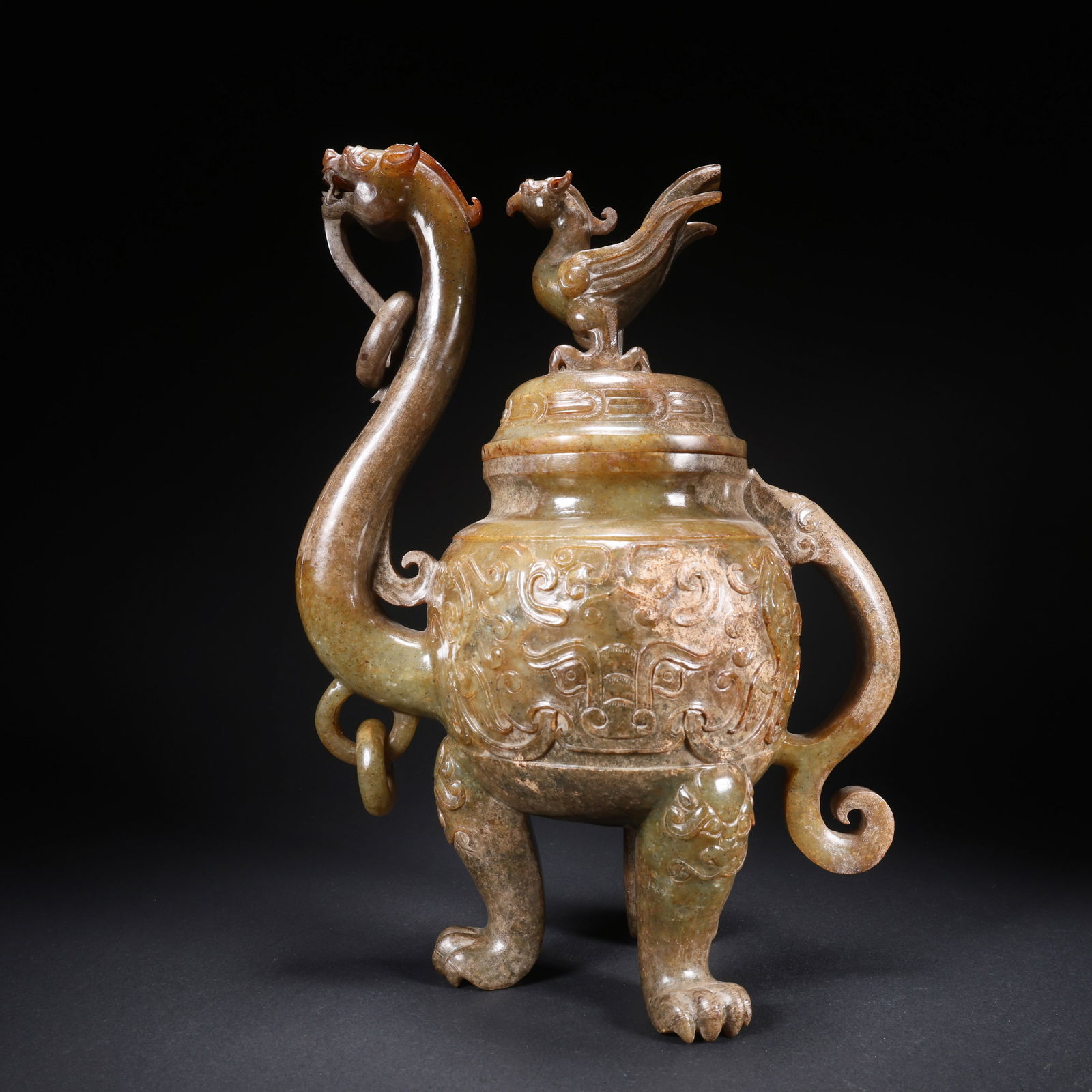 A HETIAN JADE THREE-LEGGED DOUBLE-RING COVERED CENSER WITH DRAGON AND PHOENIX MOTIF: Hetian Jade Three-Legged Double-Ring Covered Censer with Dragon and Phoenix Motif