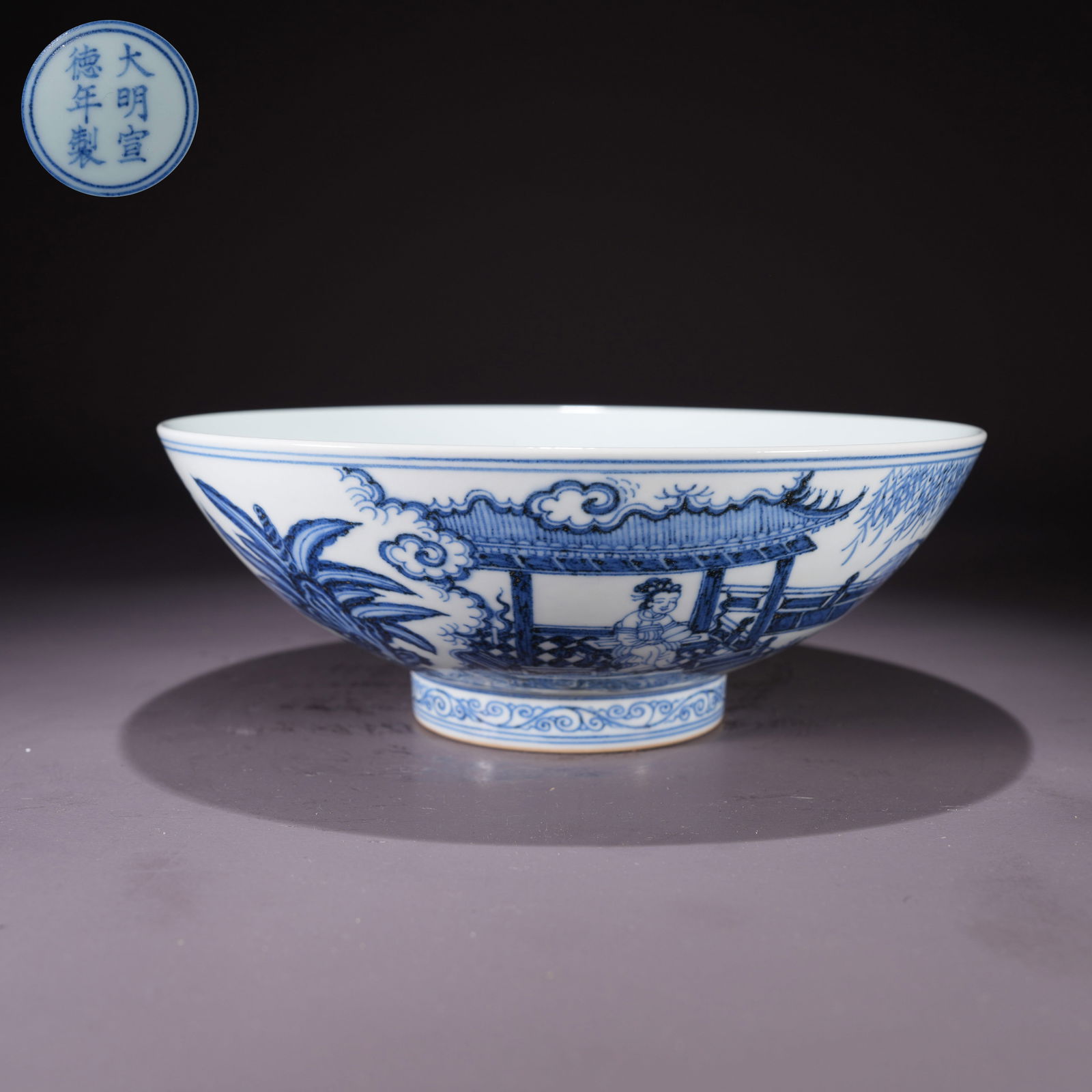 A LARGE BLUE-AND-WHITE BOWL WITH CHILDREN AT PLAY IN GARDEN SCENE: Large Blue-and-White Bowl with Children at Play in Garden Scene