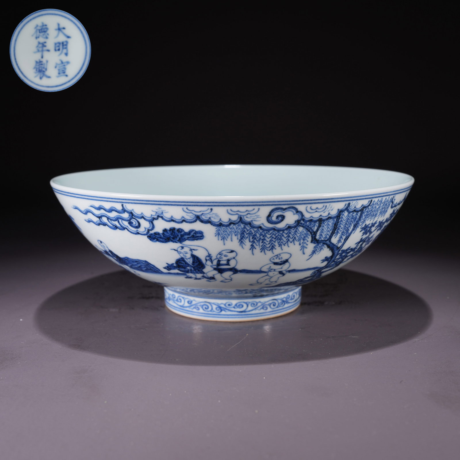 A LARGE BLUE-AND-WHITE BOWL WITH "HUNDRED BOYS" AT PLAY IN GARDEN SCENE: Large Blue-and-White Bowl with "Hundred Boys" at Play in Garden Scene