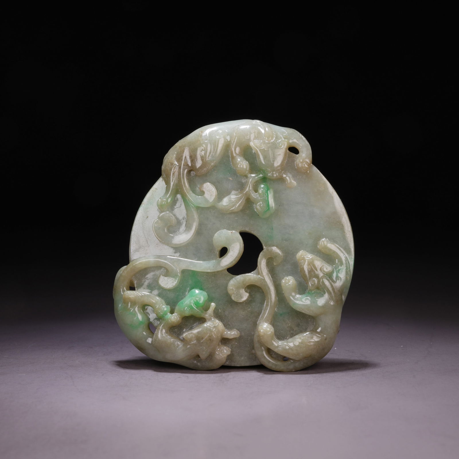 A JADEITE BI DISC WITH CHI-DRAGON MOTIF AND RAISED OUTER RIM: Jadeite Bi Disc with Chi-Dragon Motif and Raised Outer Rim