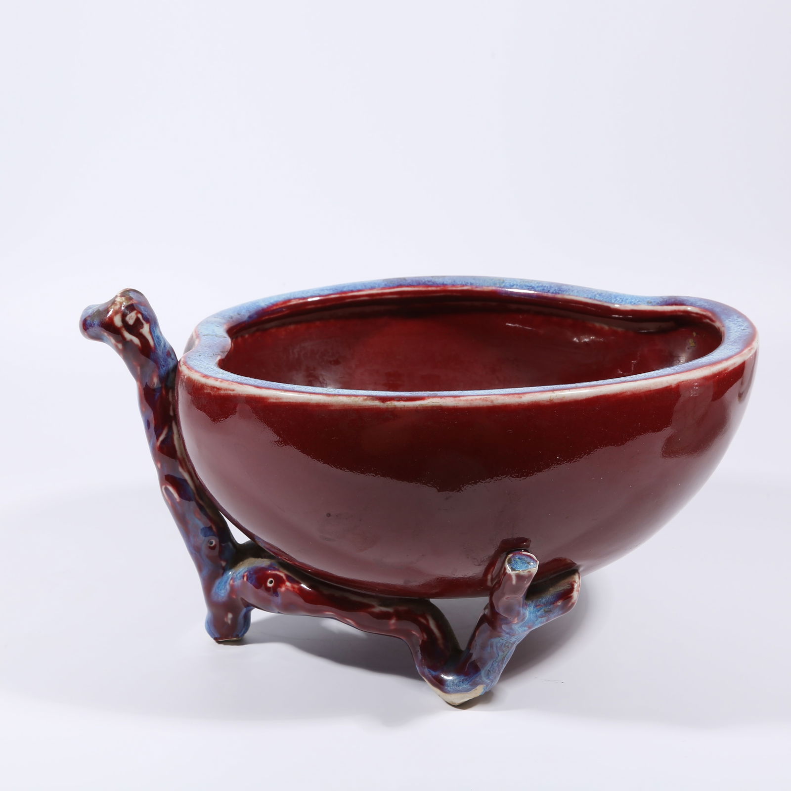 A FLAMBÉ GLAZED PEACH-SHAPED WASHER: Flambé Glazed Peach-shaped Washer