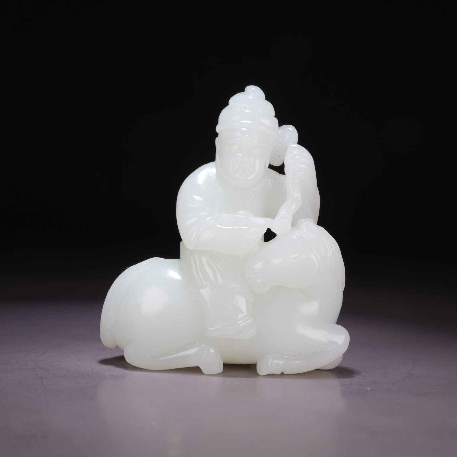 A HETIAN WHITE JADE ORNAMENT OF A FOREIGNER RIDING A HORSE: Hetian White Jade Ornament of a Foreigner Riding a Horse