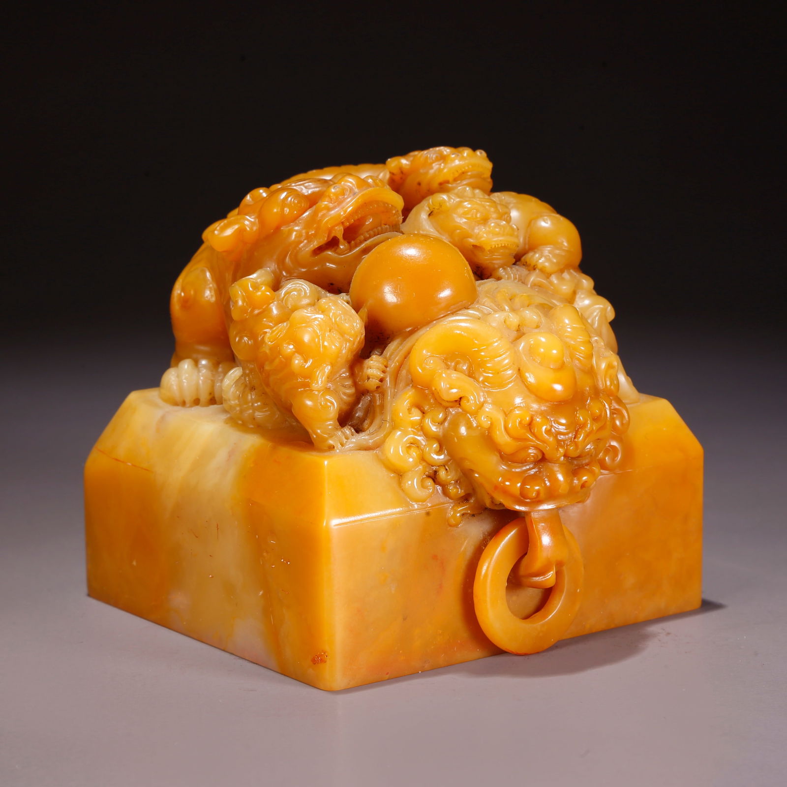 A SHOUSHAN TIANHUANG STONE SEAL WITH LARGE AND SMALL LION KNOBS: Shoushan Tianhuang Stone Seal with Large and Small Lion Knobs