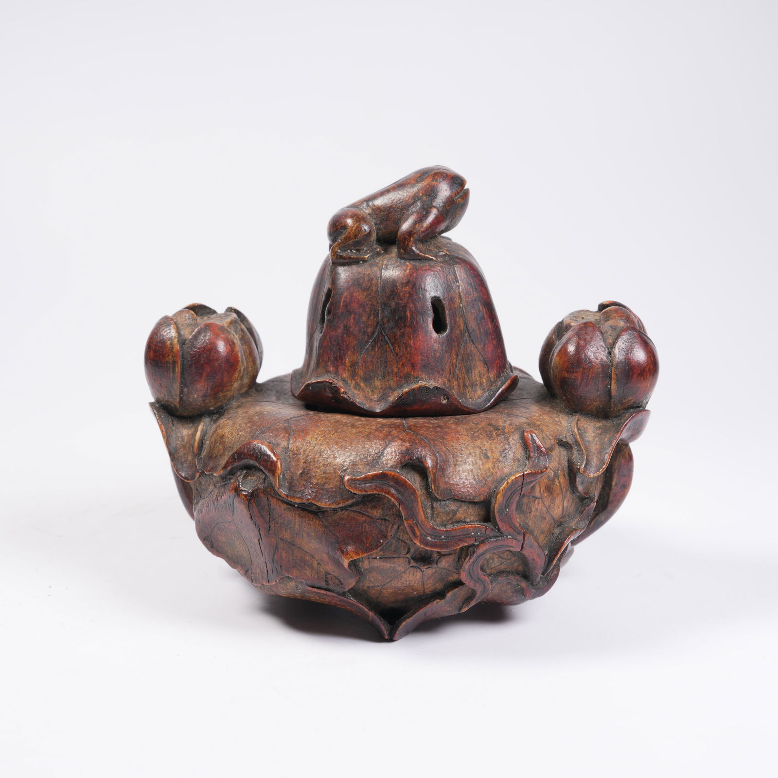 A HUANGHUALI LOTUS-HANDLED INCENSE BURNER: Huanghuali Lotus-Handled Incense Burner