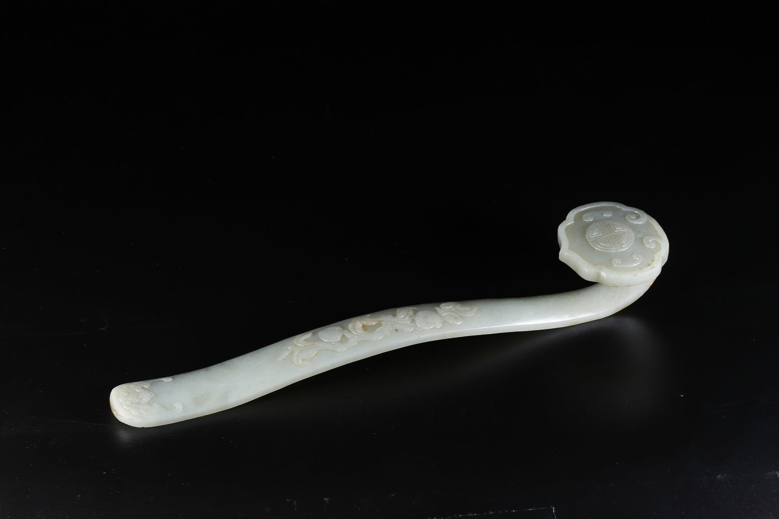 A HETIAN JADE CARVED RUYI WITH "FORTUNE AND LONGEVITY" MOTIF (1 of 10)