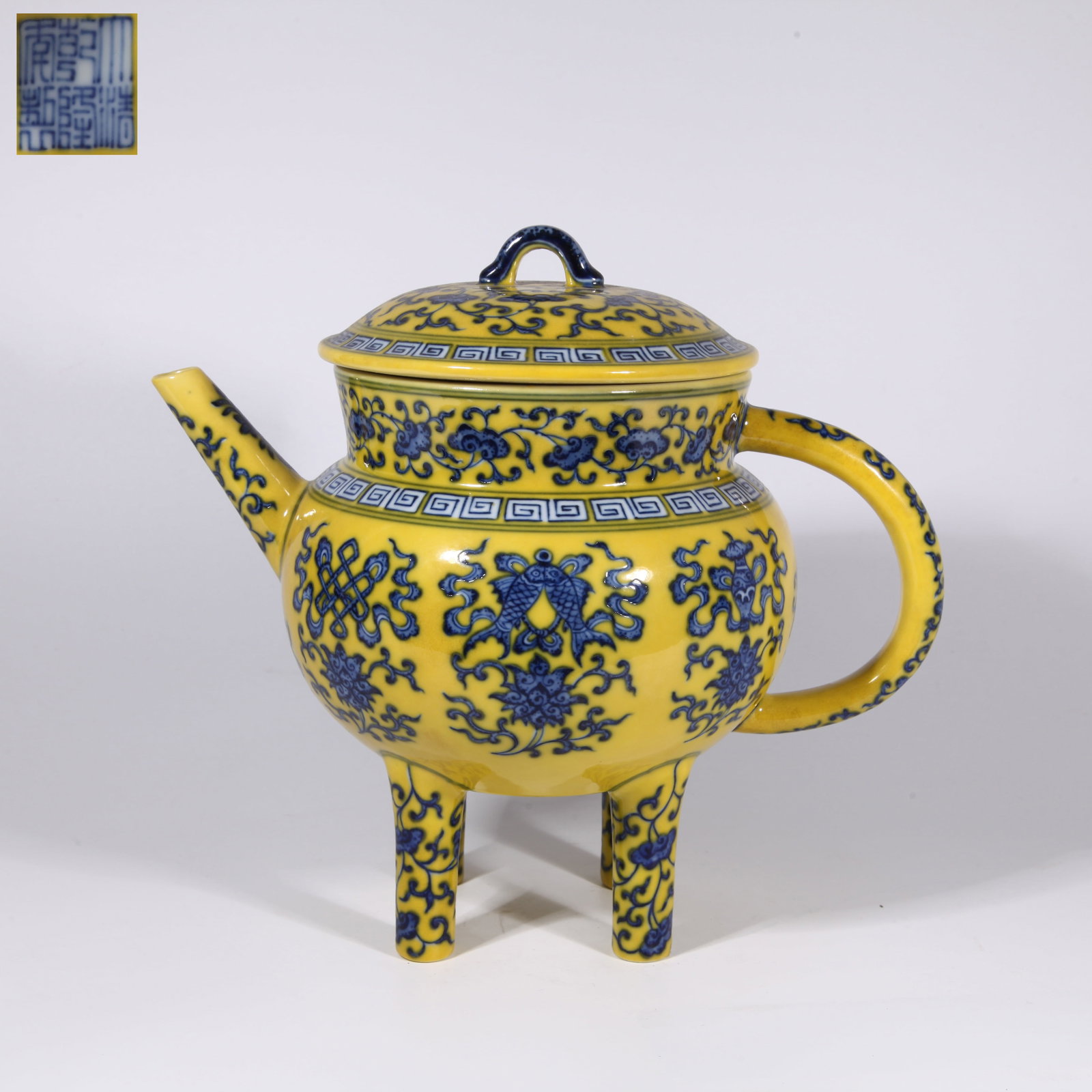 A YELLOW GROUND BLUE-AND-WHITE EIGHT AUSPICIOUS SYMBOLS HEHU VASE (1 of 9)