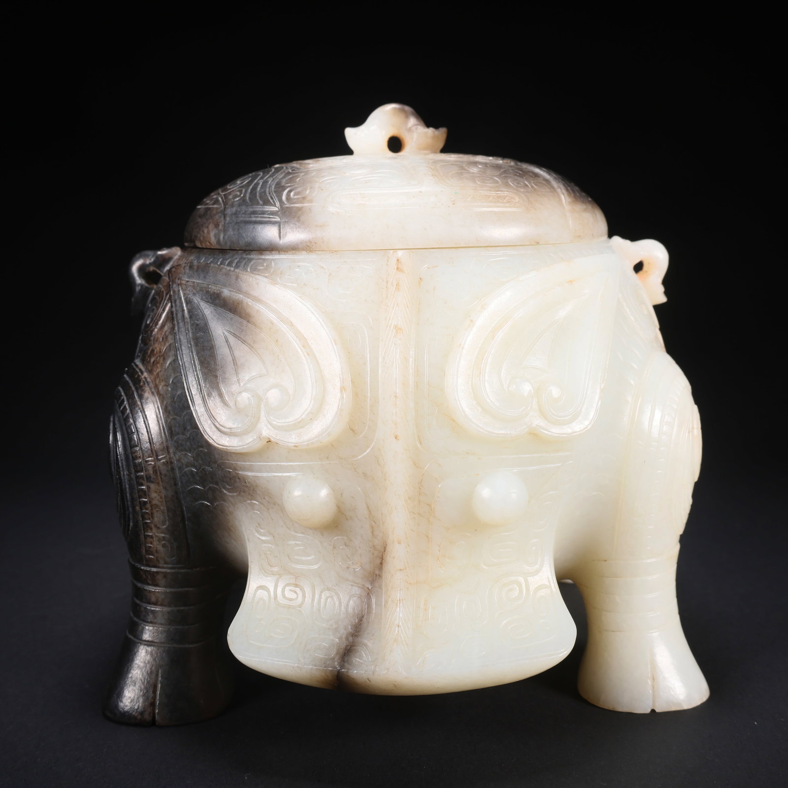 A HETIAN JADE FOUR-FOOT COVERED JAR WITH HUMAN FACE AND BEAST BODY (1 of 9)