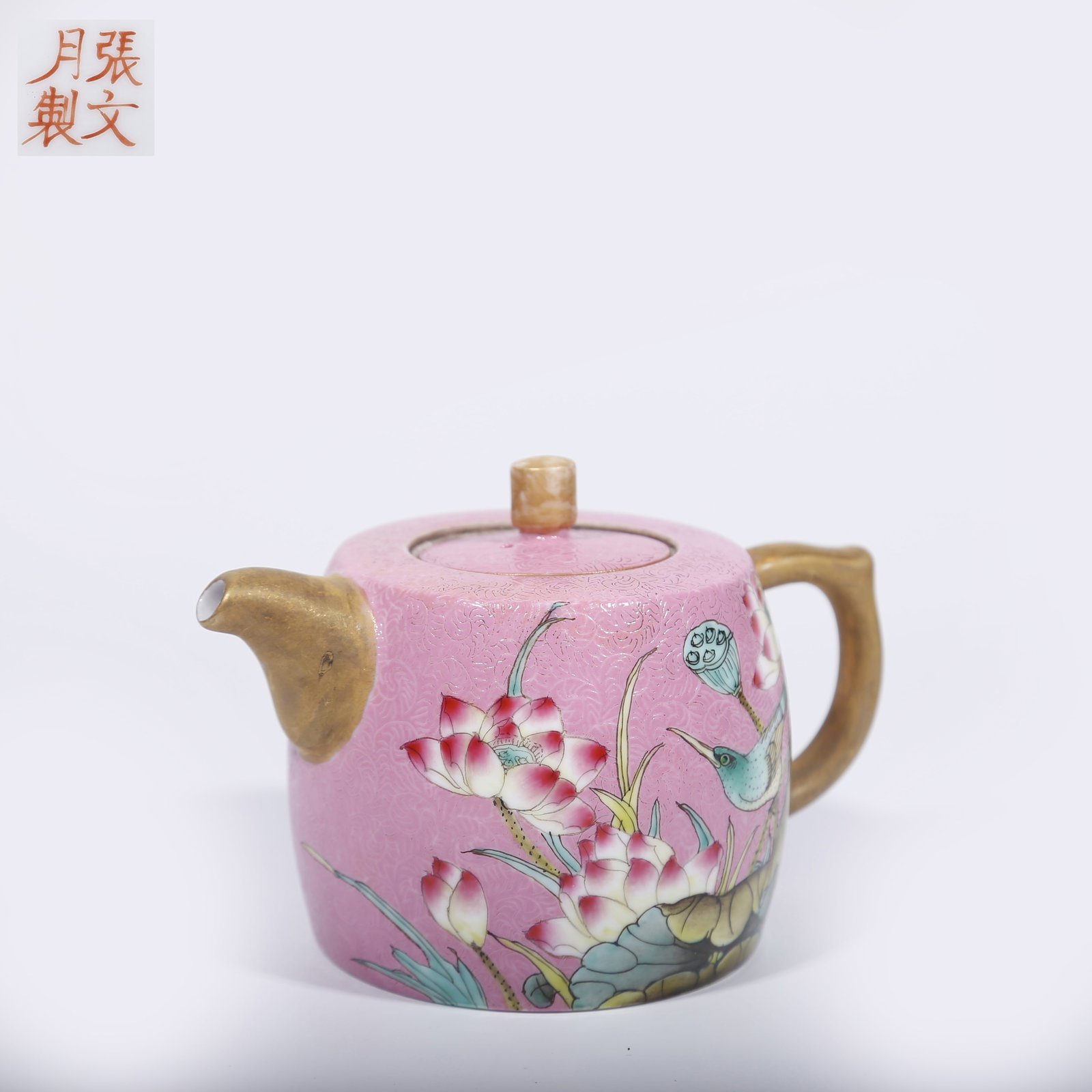 A ROUGE-RED GROUND OVERGLAZE FAMILLE ROSE EWER WITH FLOWER AND BIRD MOTIF (1 of 9)
