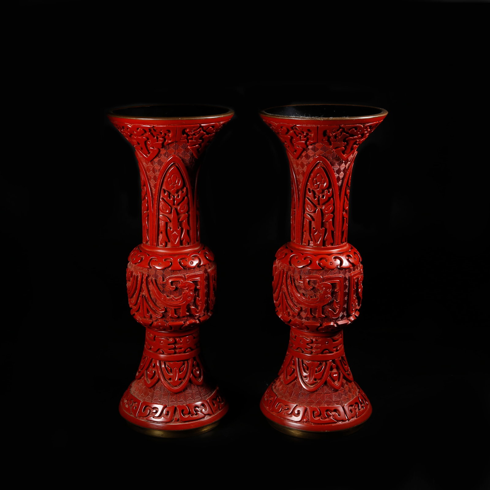 A SET OF CARVED RED LACQUER FLOWER GU WITH BEAST MOTIF (1 of 8)