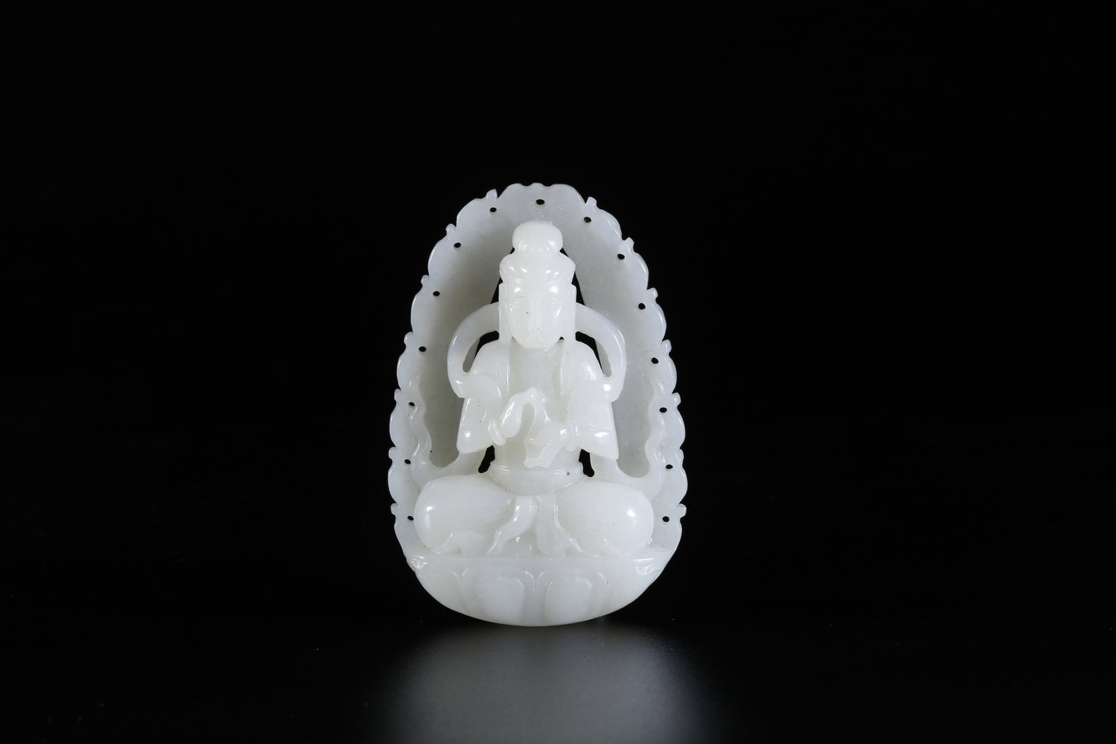A HETIAN JADE CARVED GUANYIN PENDANT (1 of 9)