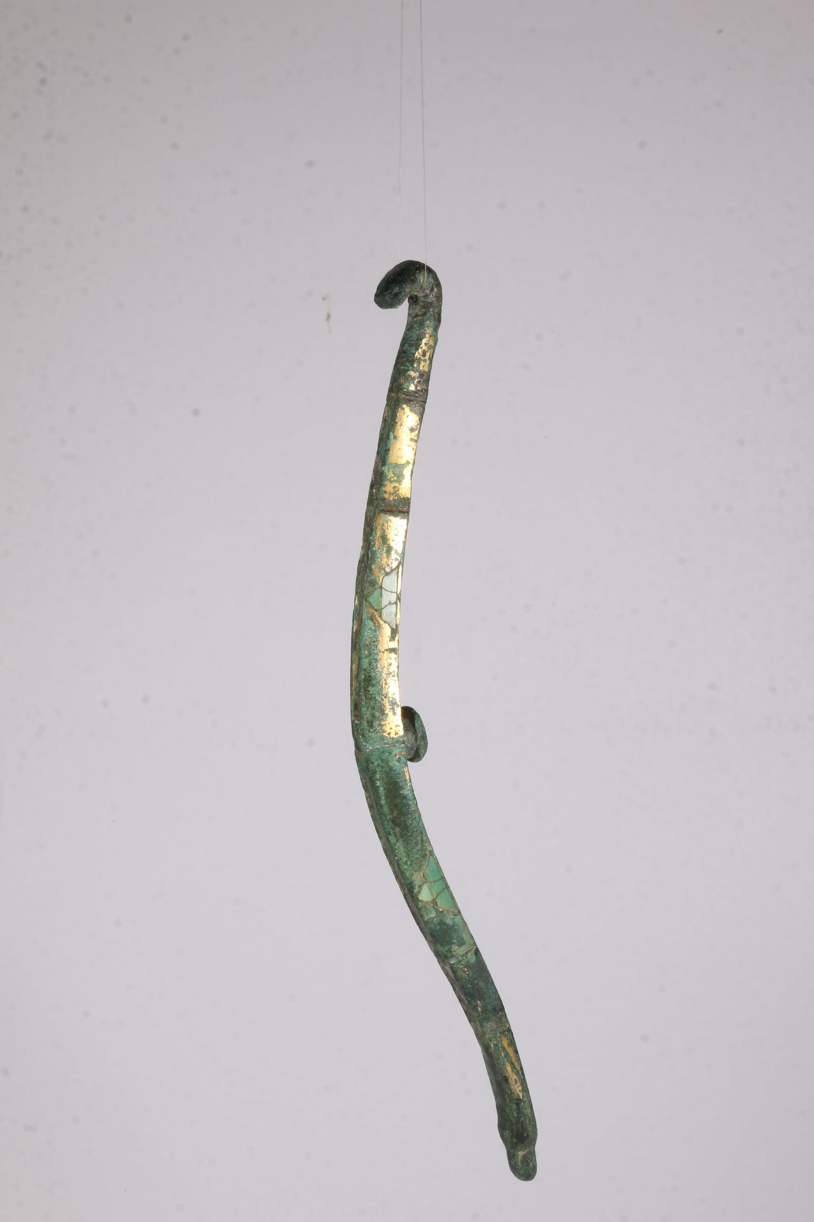 A BRONZE BELT HOOK INLAID WITH TURQUOISE (1 of 12)