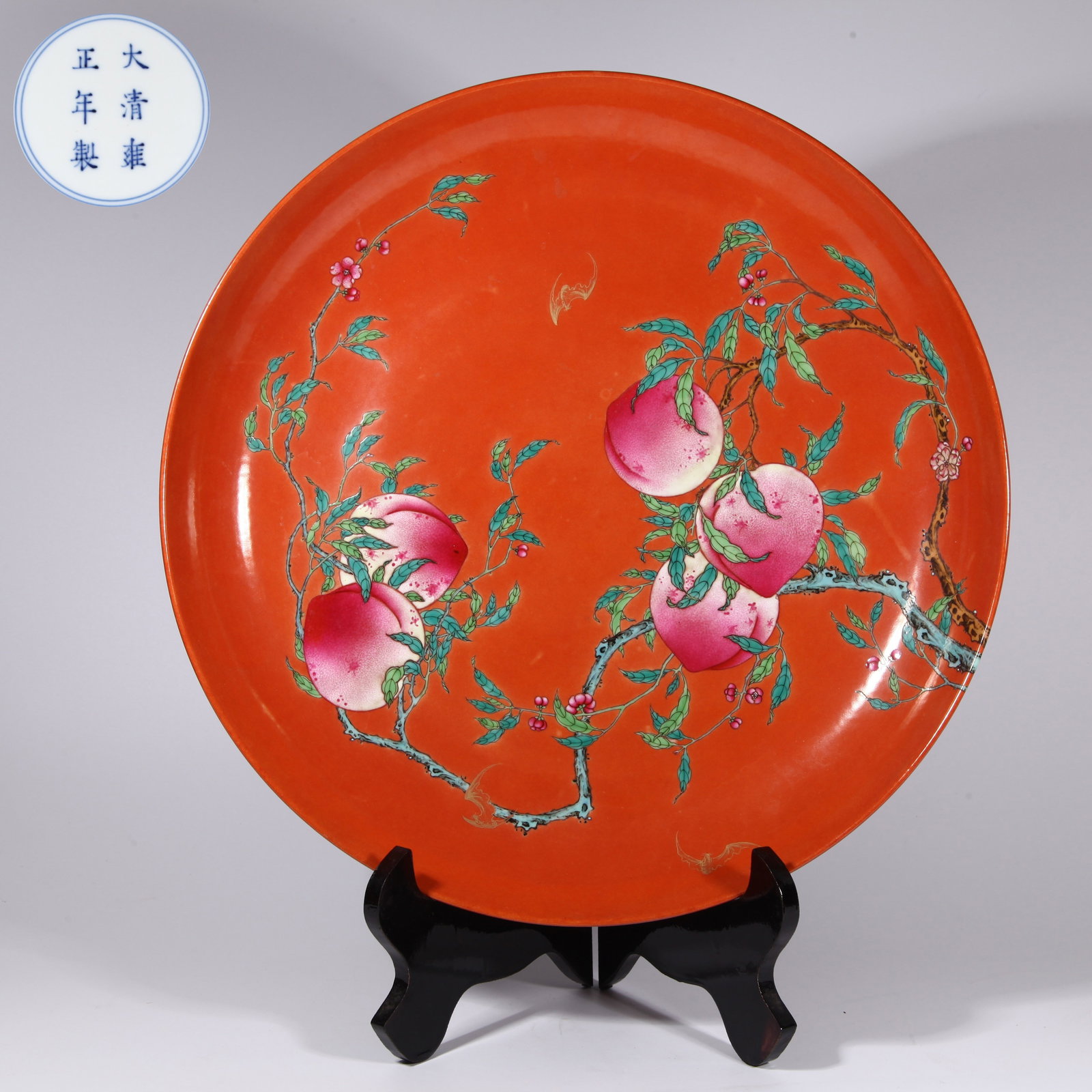 A CORAL-RED GROUND FAMILLE ROSE "DOUBLE BLESSING OF FORTUNE AND LONGEVITY" LARGE PLATE (1 of 7)