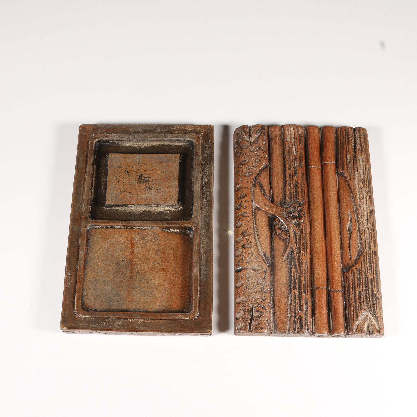 A INKSTONE WITH PLUM BLOSSOM MOTIF (1 of 7)