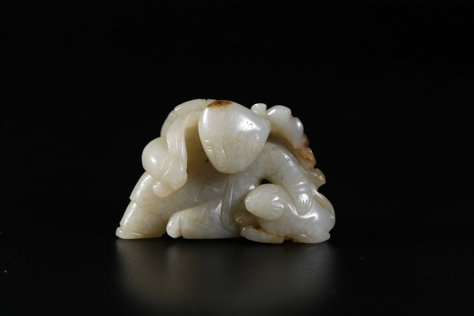 A HETIAN JADE CARVED BOY FIGURE ORNAMENT (1 of 9)