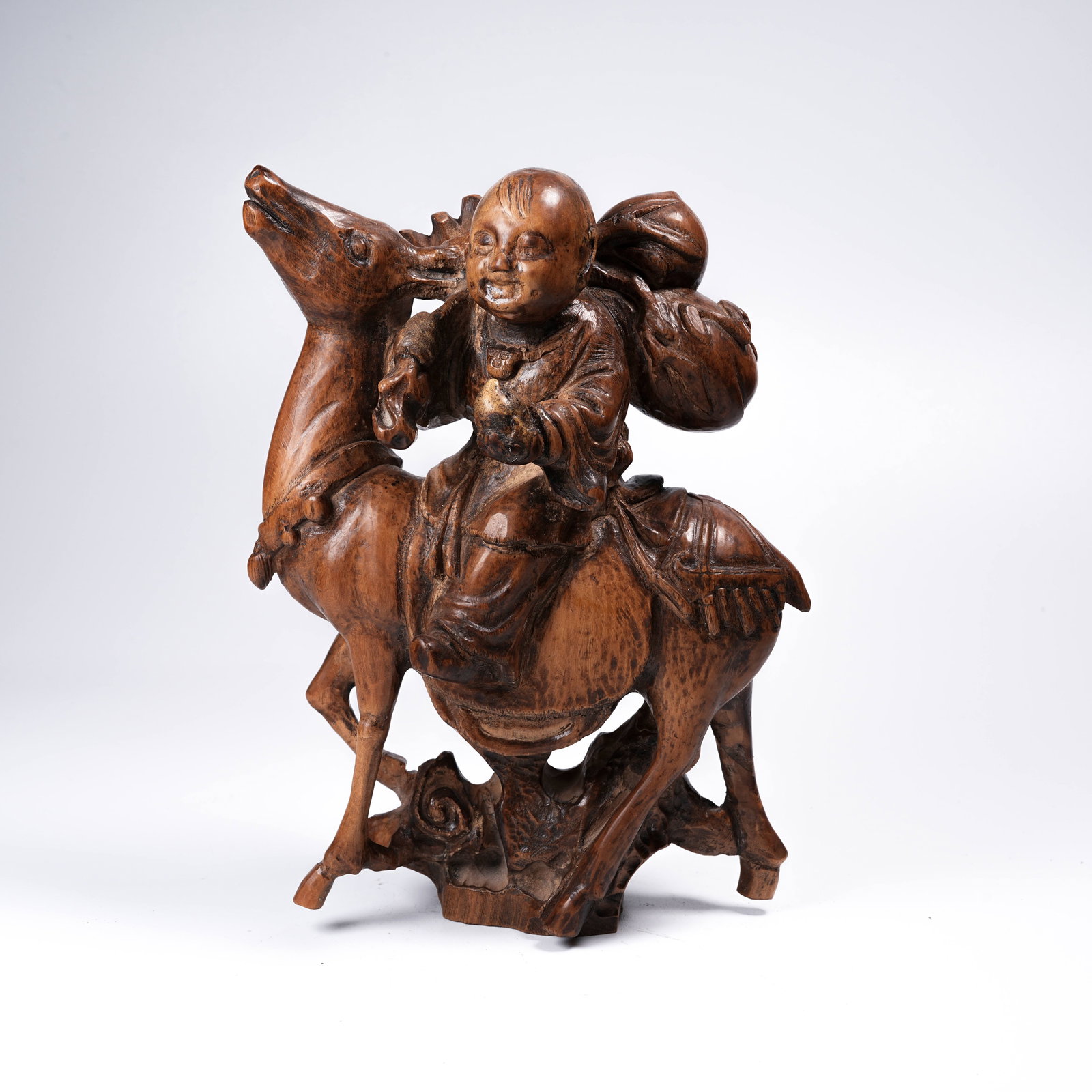 A BOXWOOD "BOY PRESENTING LONGEVITY" ORNAMENT (1 of 8)