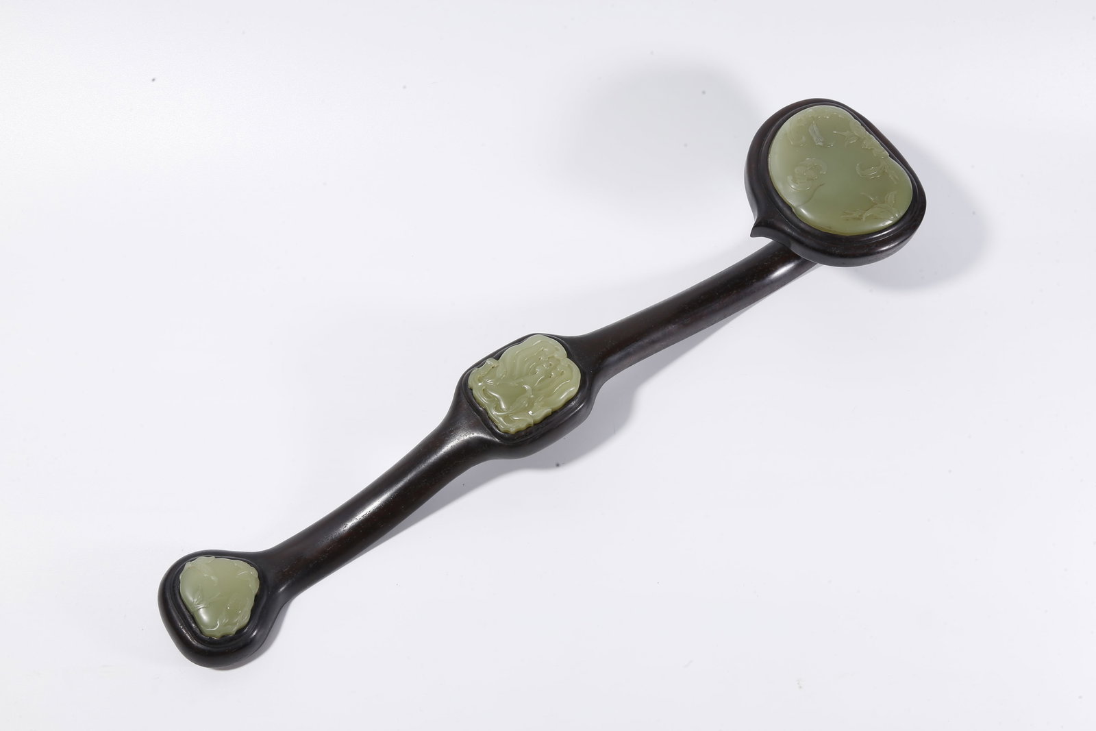 A ZITAN WOOD INLAID WITH HETIAN YELLOW JADE CARVED RUYI WITH "FORTUNE, PROSPERITY, AND LONGEVITY" (1 of 9)