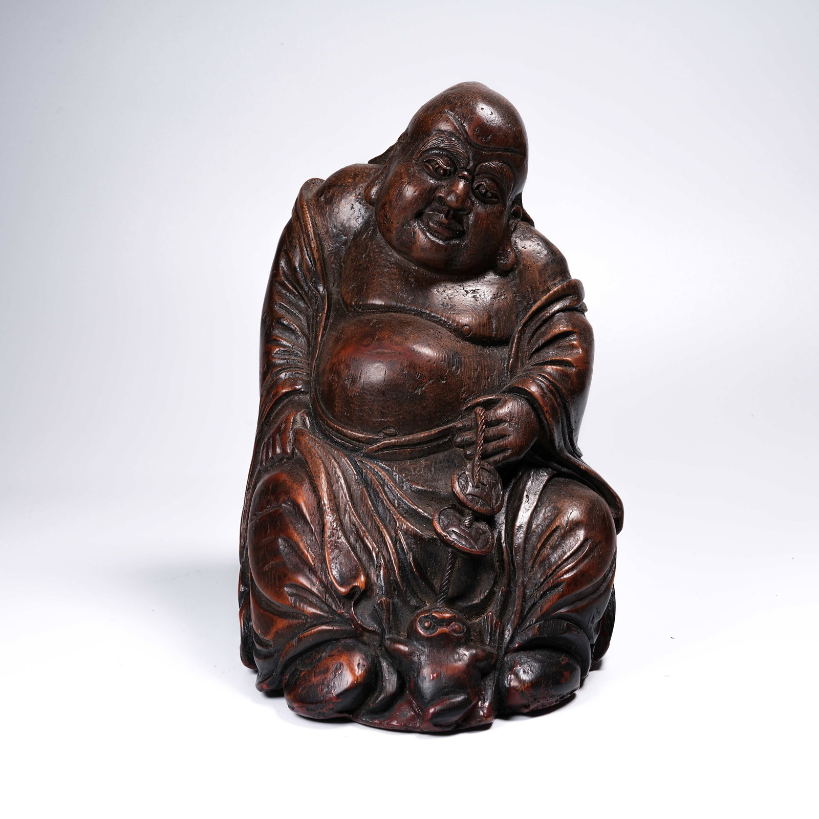 A HARDWOOD "LIU HAI PLAYING WITH THE GOLDEN TOAD" ORNAMENT (1 of 8)