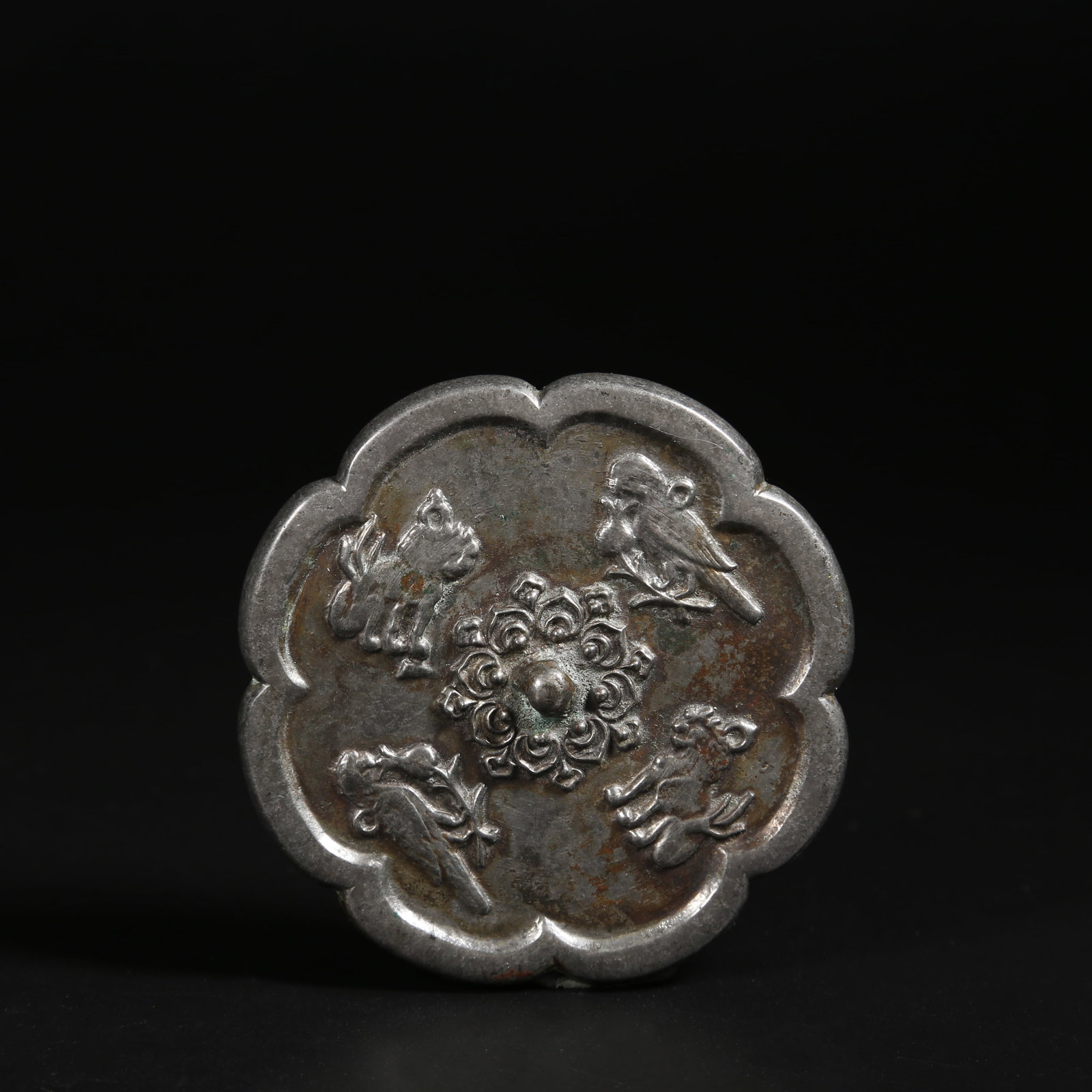 A BRONZE MIRROR WITH FLOWER AND BIRD MOTIF (1 of 7)