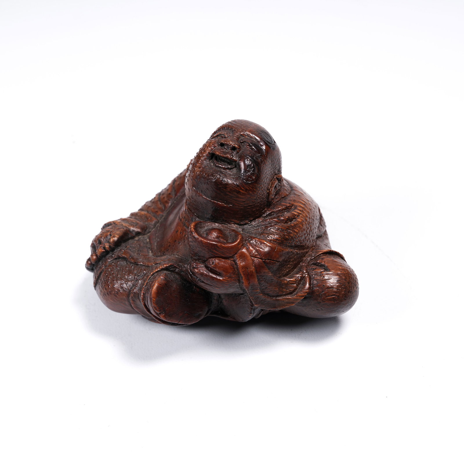 A BAMBOO ROOT CARVED ARHAT FIGURINE (1 of 8)