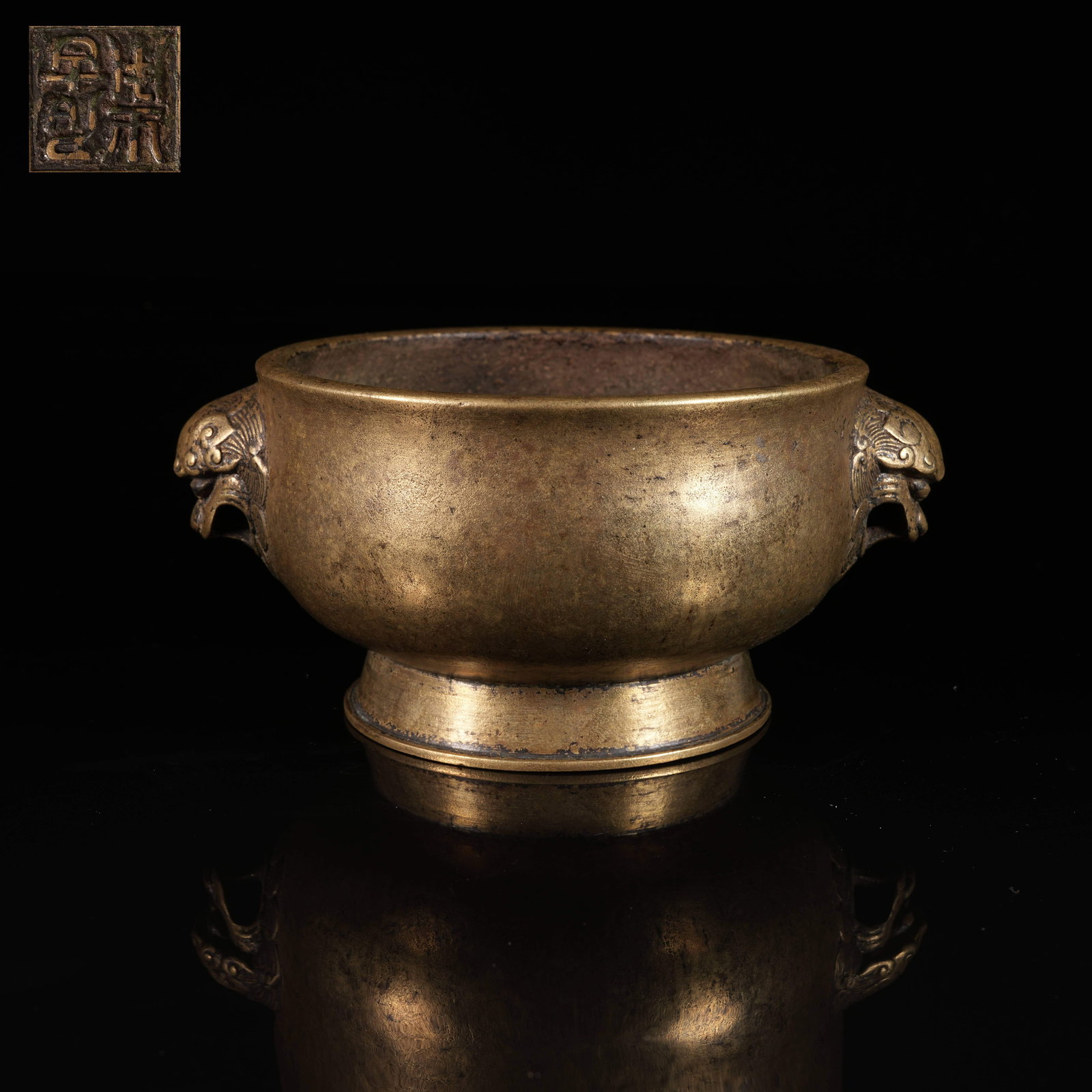 A BRONZE CENSER WITH LION-HEAD HANDLES (1 of 9)