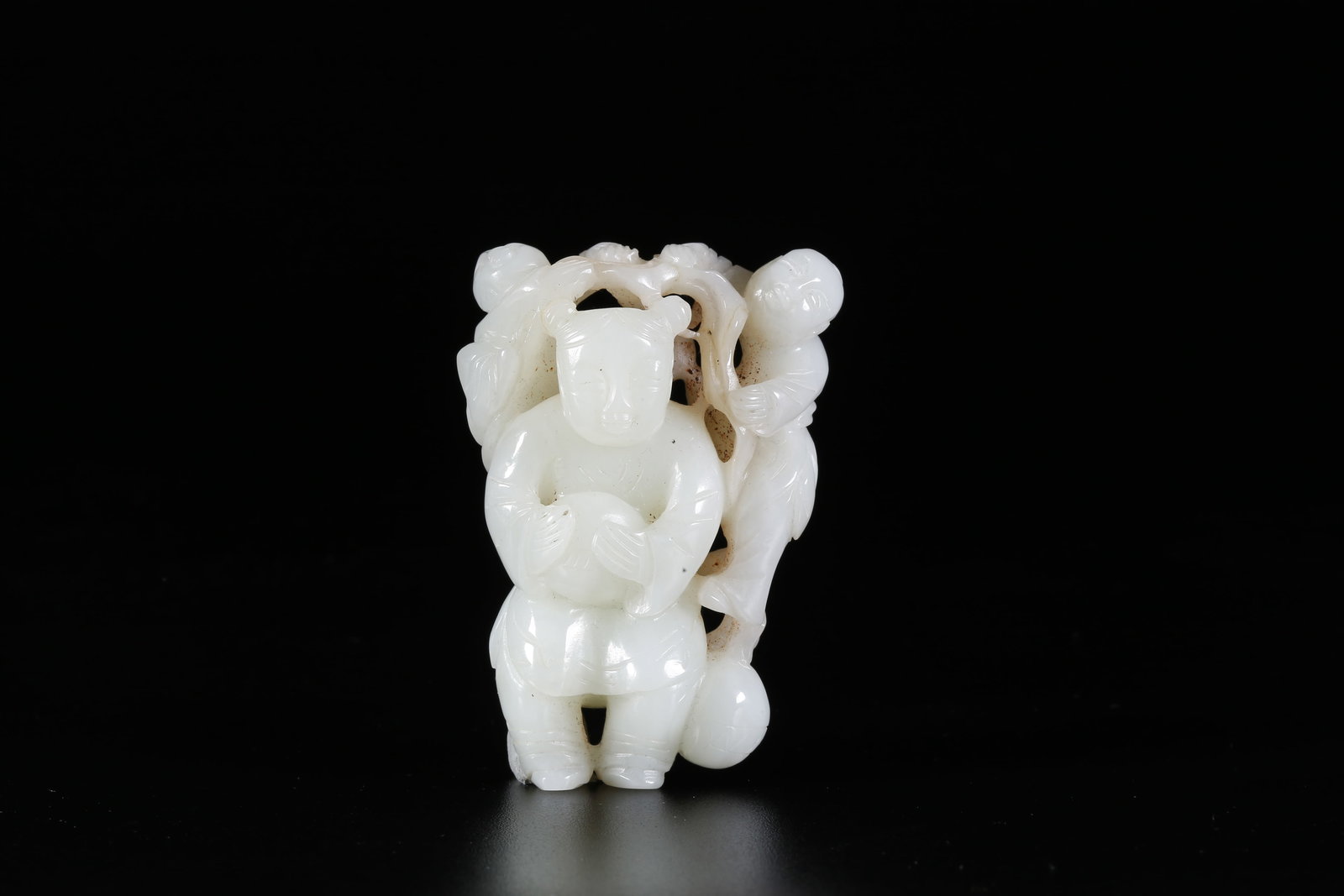 A HETIAN JADE CARVED BOY FIGURE ORNAMENT: Hetian Jade Carved Boy Figure Ornament