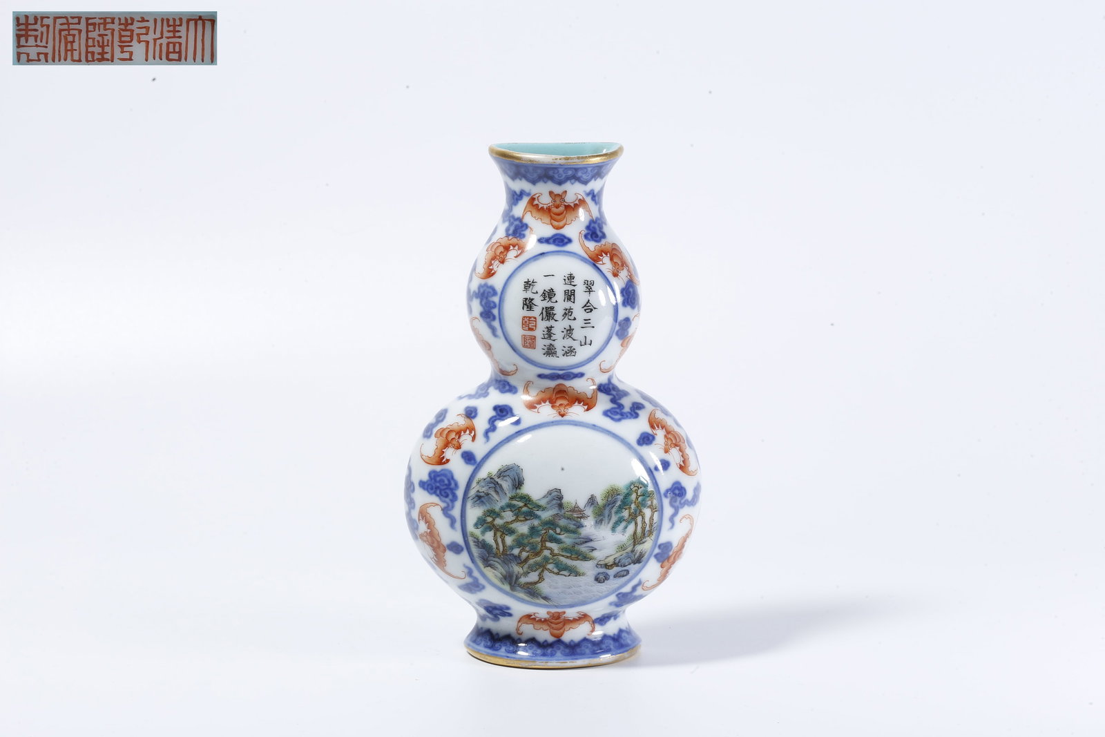 A BLUE-AND-WHITE UNDERGLAZE-RED AND FAMILLE ROSE WALL VASE WITH OPEN-WINDOW LANDSCAPE DECORATION (1 of 10)