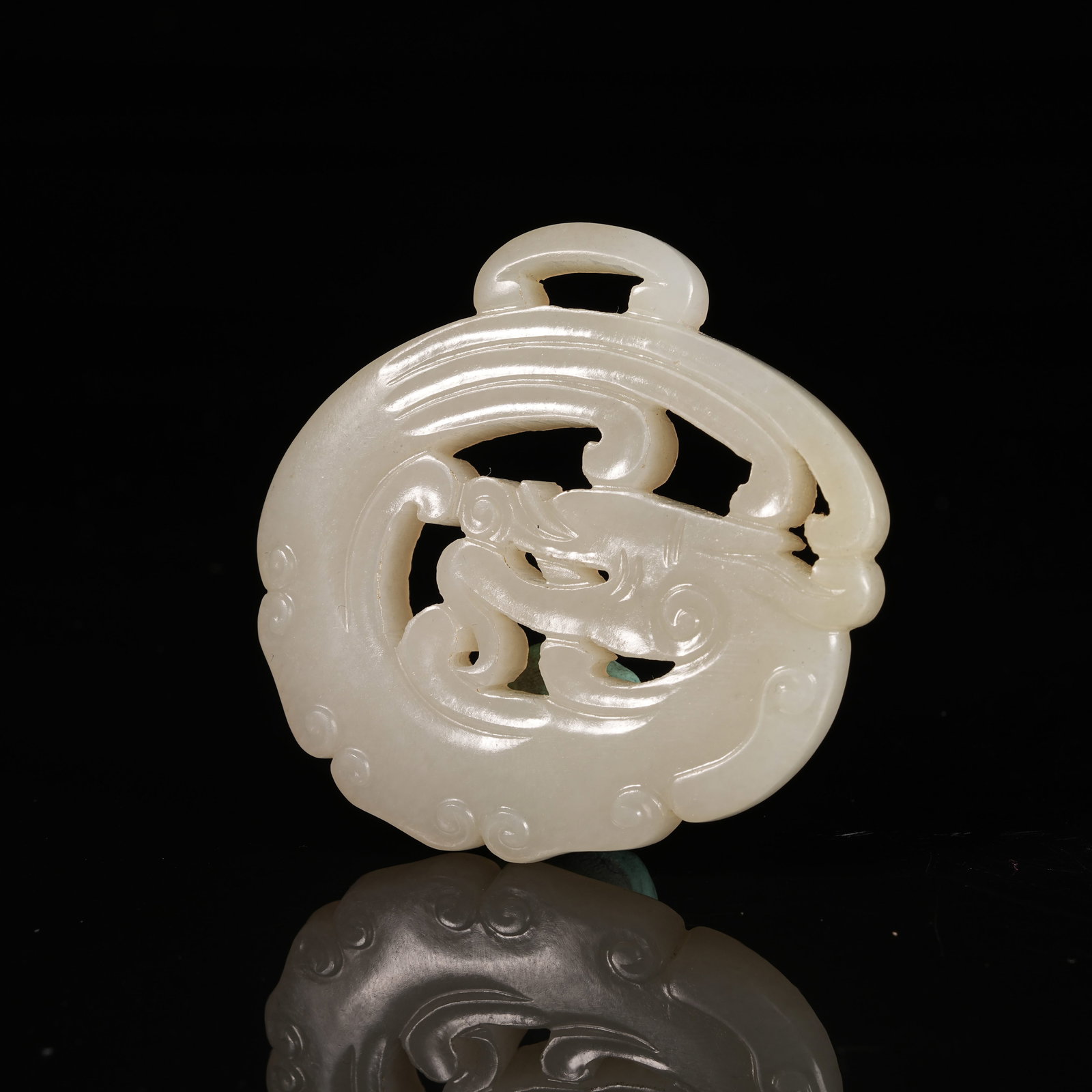 A HETIAN JADE DRAGON PENDANT (1 of 9)